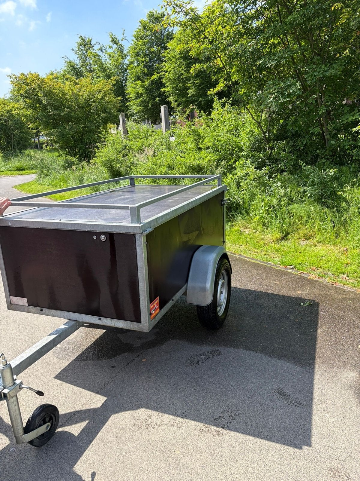 Compacte aanhangwagen met deksel en imperiaal, Ophalen, Gebruikt