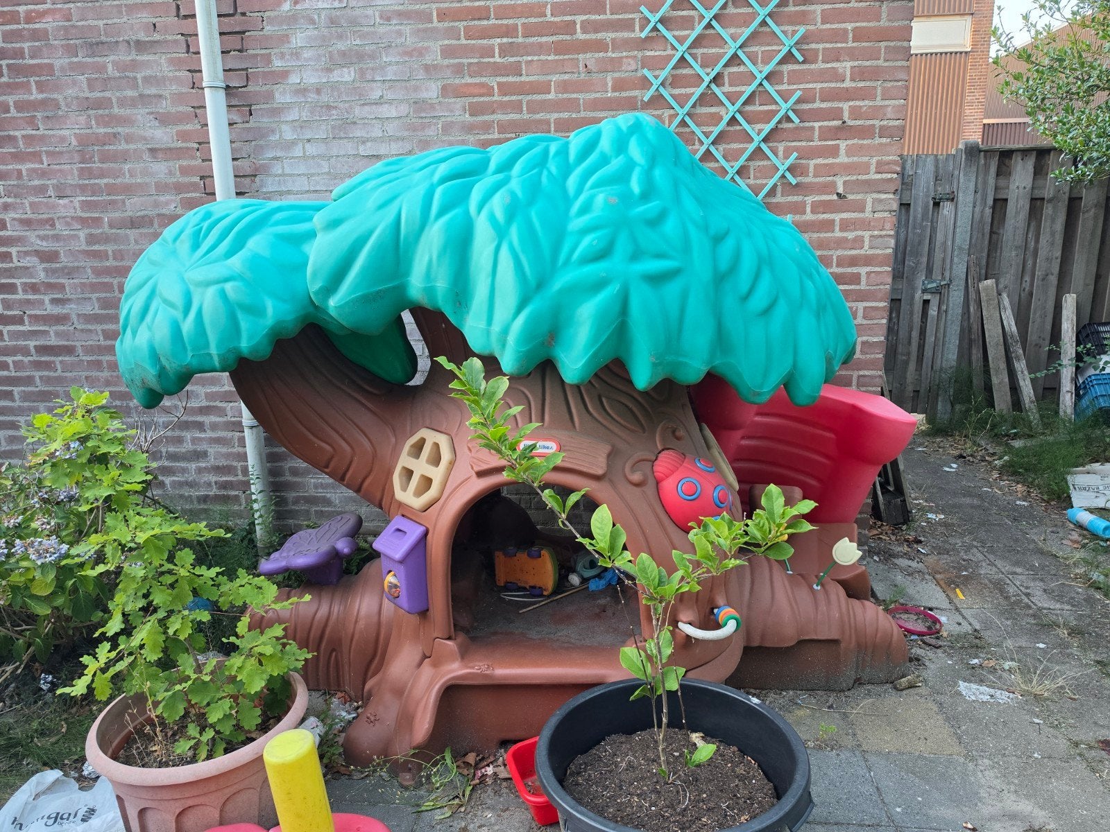 Kunststof speelhuisje in de vorm van een boom, Ophalen