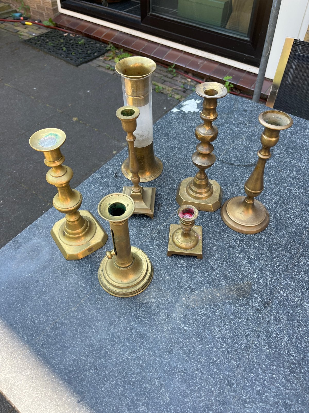 Set van 7 messing kandelaars, Ophalen of Verzenden, Koper of Brons