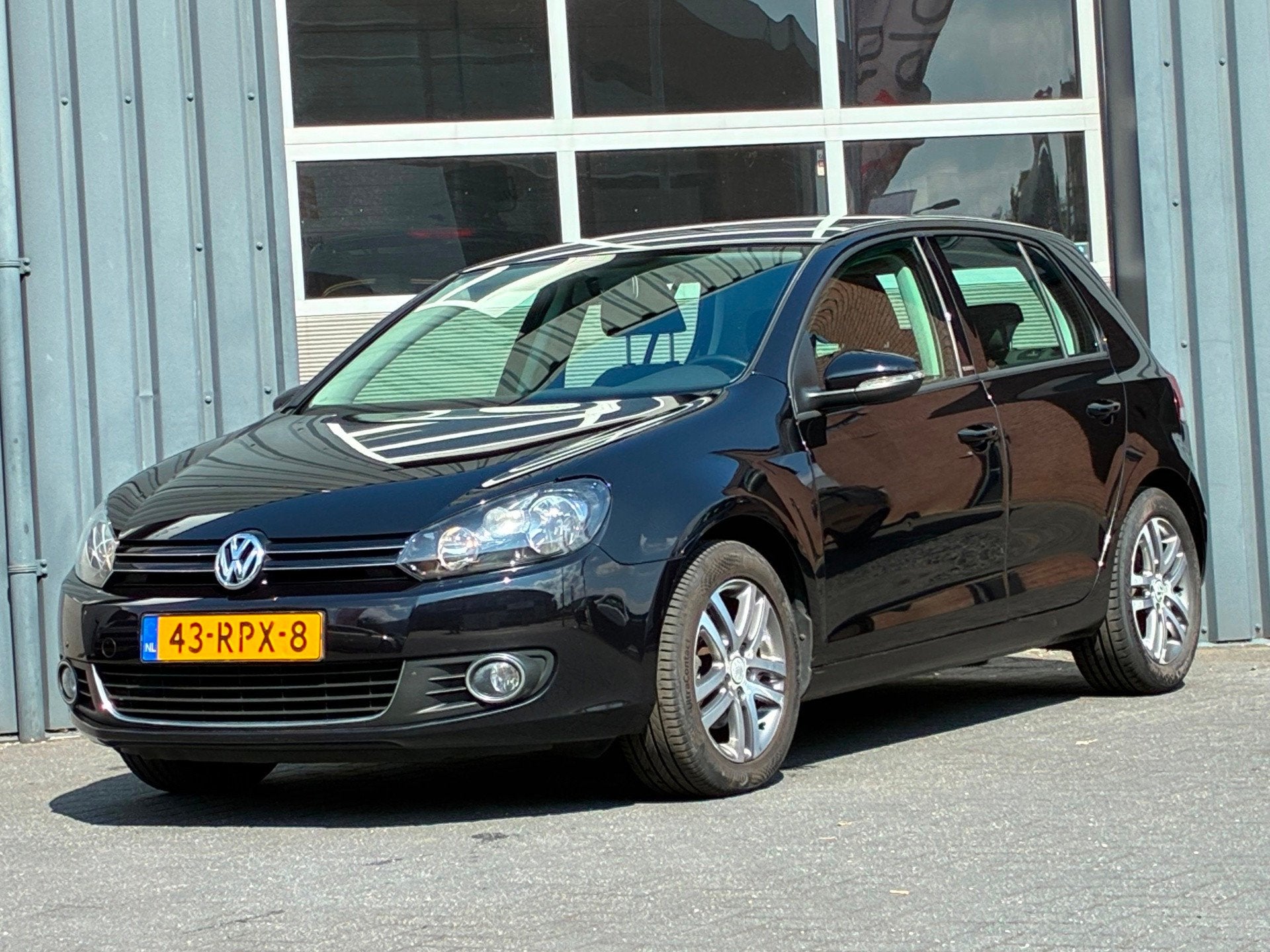 Volkswagen Golf 1.2 TSI Style Automaat Climate controle Trek, Auto's, Euro 5, Gebruikt, 4 cilinders, Zwart