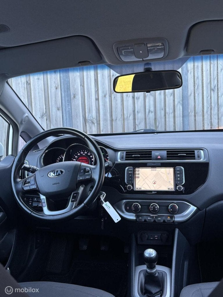 Kia Rio 1.2 CVVT DynamicLine/LED/CRUISE/NAP/BLUETOOTH/NAVI/, Auto's, 1027 kg, Euro 6, Wit, Origineel Nederlands
