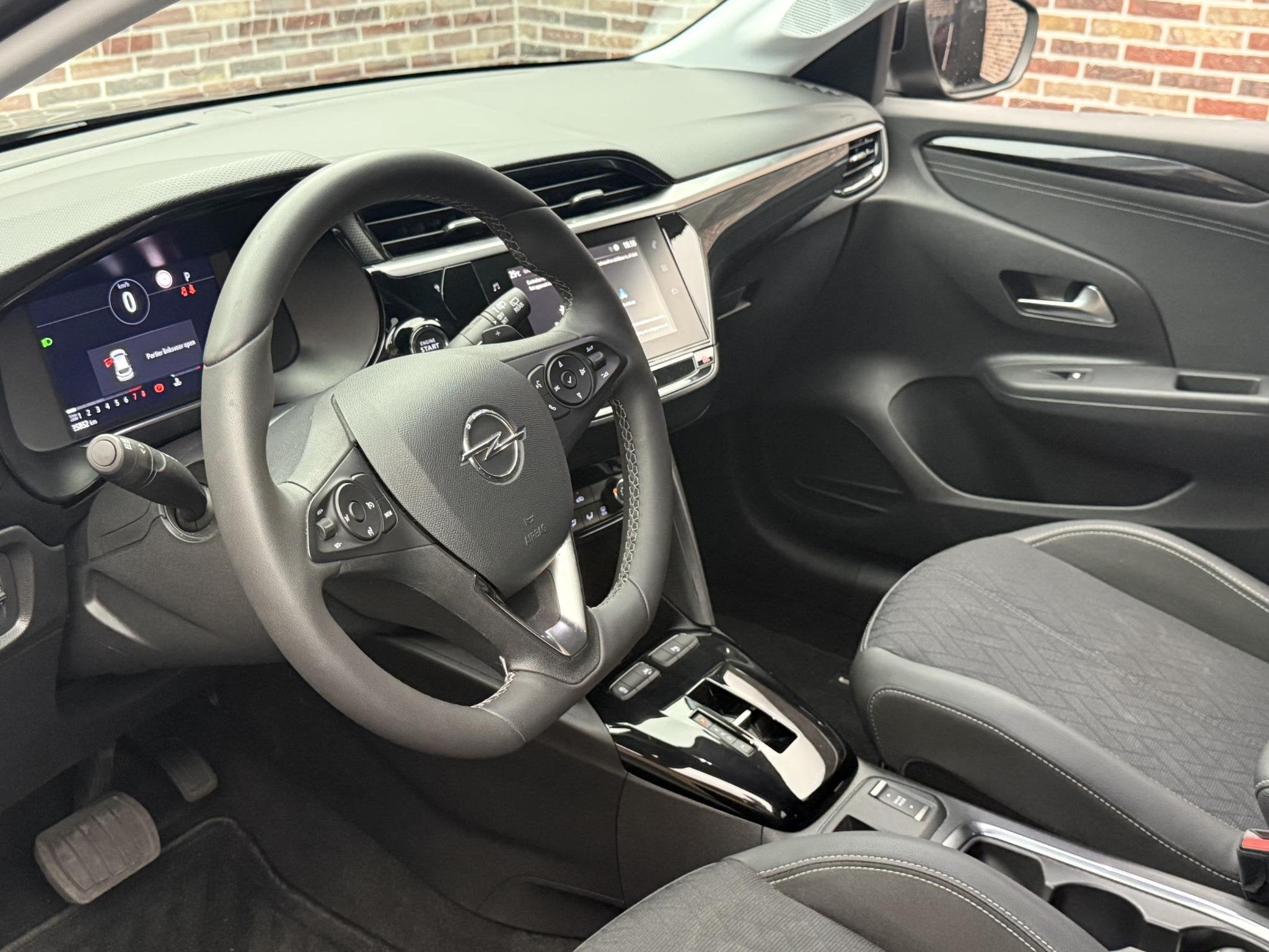 Opel Corsa 1.2 Elegance, Auto's, Stof, Gebruikt, Euro 6, Zwart