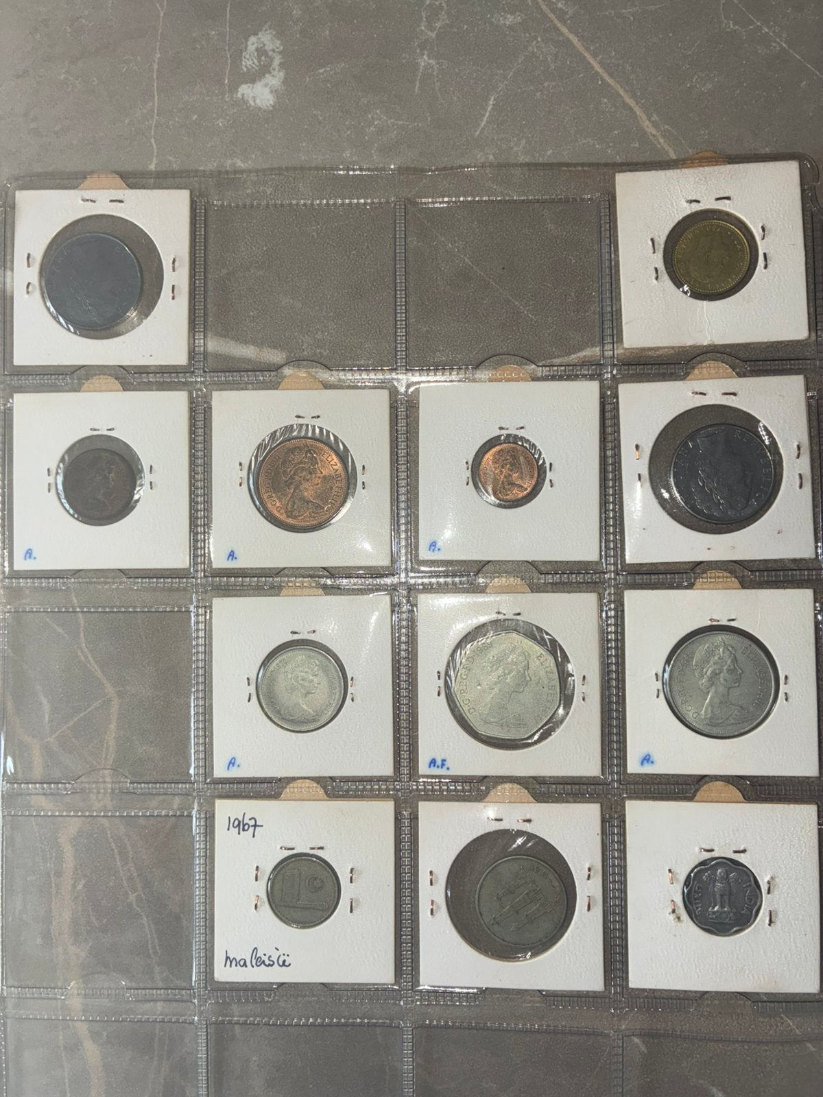 Wereldmunten verzameling in album | 1904-1980 | USA, Europa, Ophalen of Verzenden, Buitenland, Munten