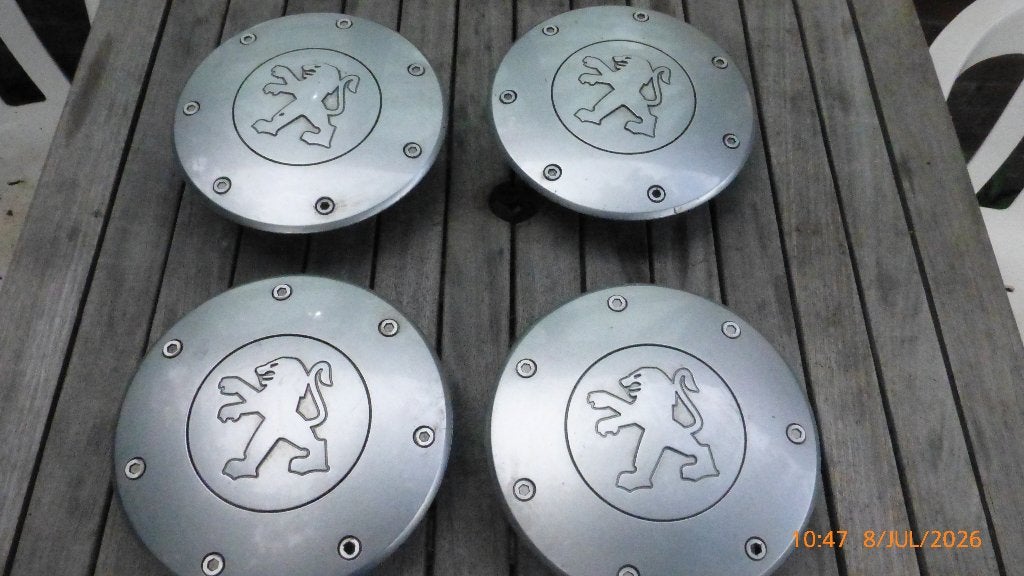 Wieldoppen Peugeot 4 stuks, Ophalen of Verzenden, Zo goed als nieuw