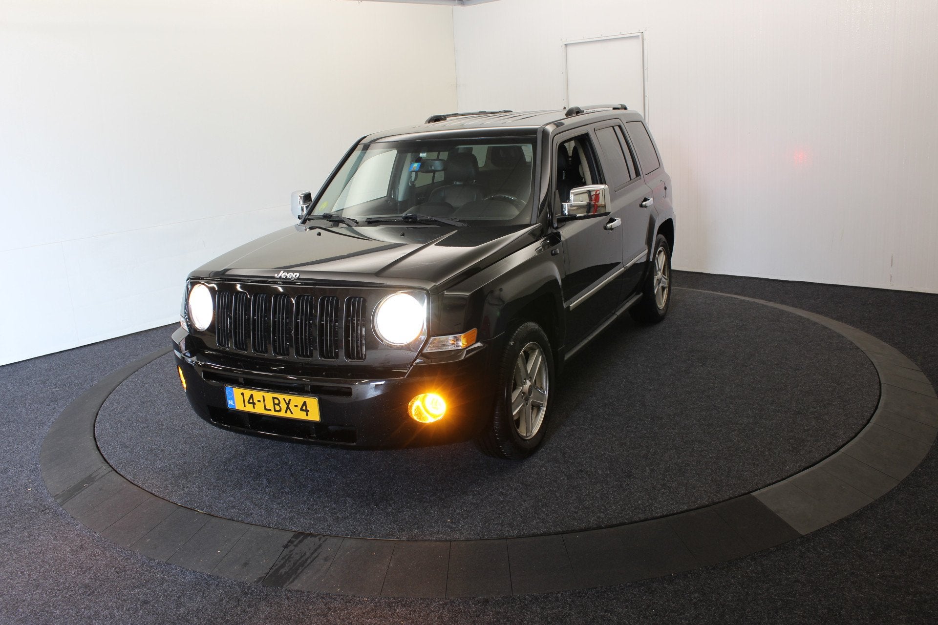 Jeep Patriot 2.4 Limited Liberty 4x4 Vol Leder Automaat, Auto's, Automaat, 450 kg, Gebruikt, Zwart