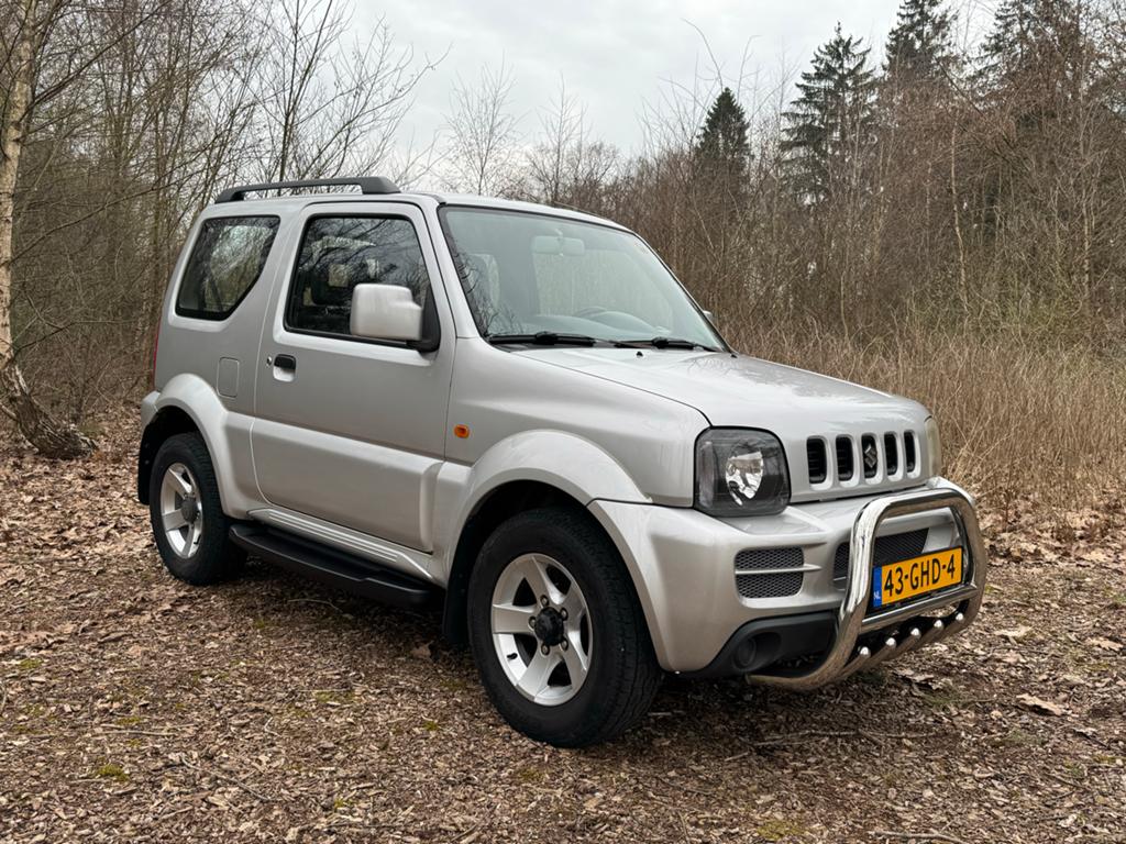 Suzuki Jimny 1.3 4WD Automaat / Trekhaak / Lm velgen, Auto's, Suzuki, Stof, 40 €/maand, 4 stoelen, Origineel Nederlands