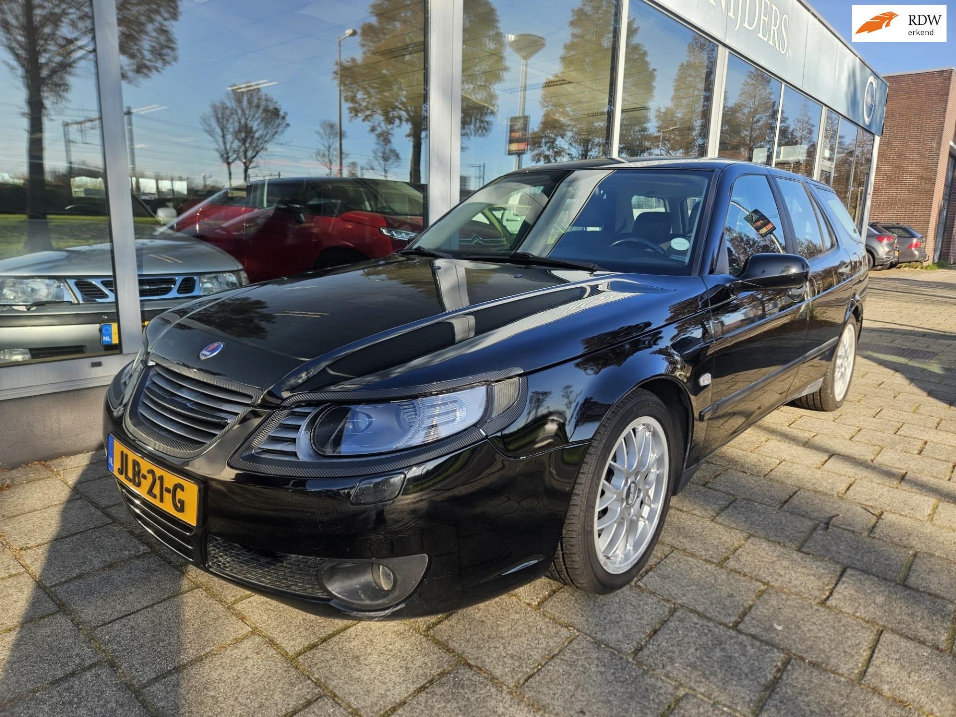 Saab 9-5 Estate 2.0t Hirsch 210 pk - Saab Specialist, Stof, 4 cilinders, Zwart, Euro 4