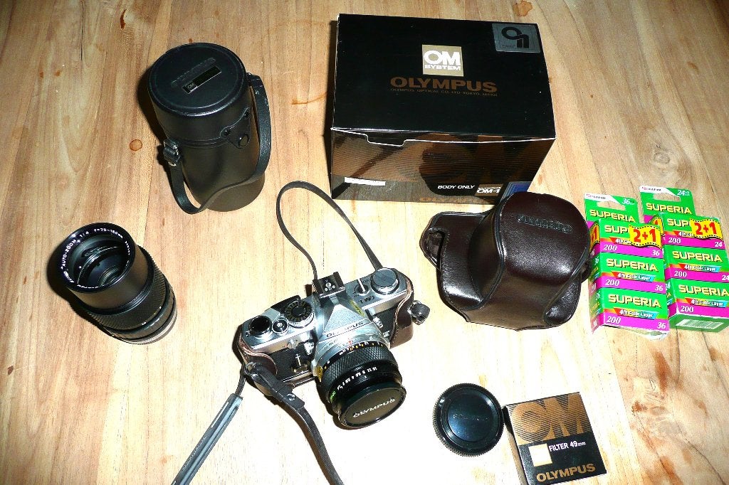 OLYMPUS OM-1 NIEUWSTAAT met originele doos + meer., Ophalen of Verzenden, Zo goed als nieuw, Spiegelreflex, Olympus