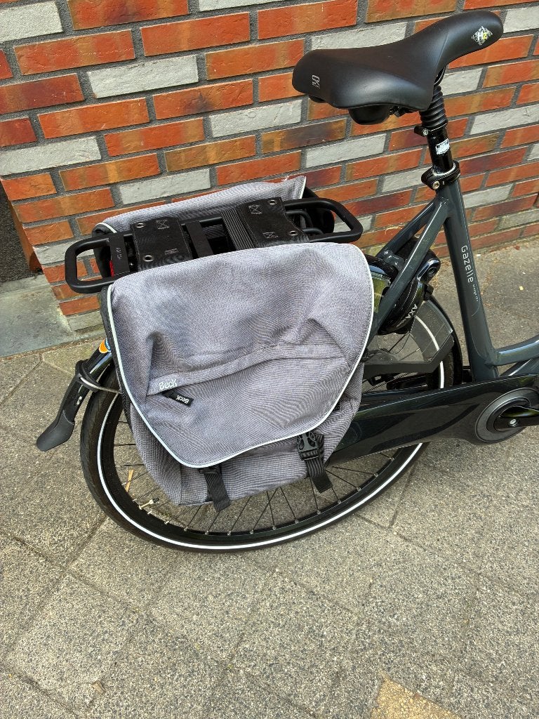 Fietstas, Ophalen, Gebruikt