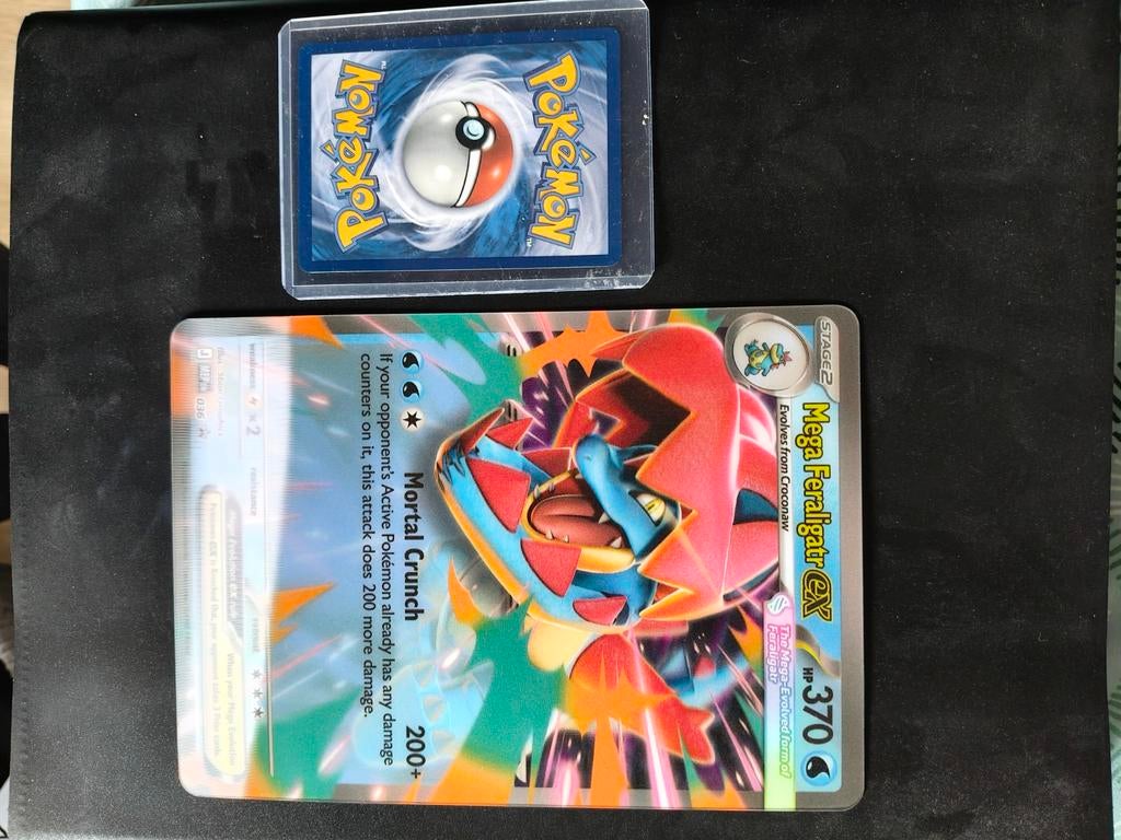 Mega Feraligatr EX & Volcanion EX Pokémon kaarten, Ophalen of Verzenden, Zo goed als nieuw, Meerdere kaarten