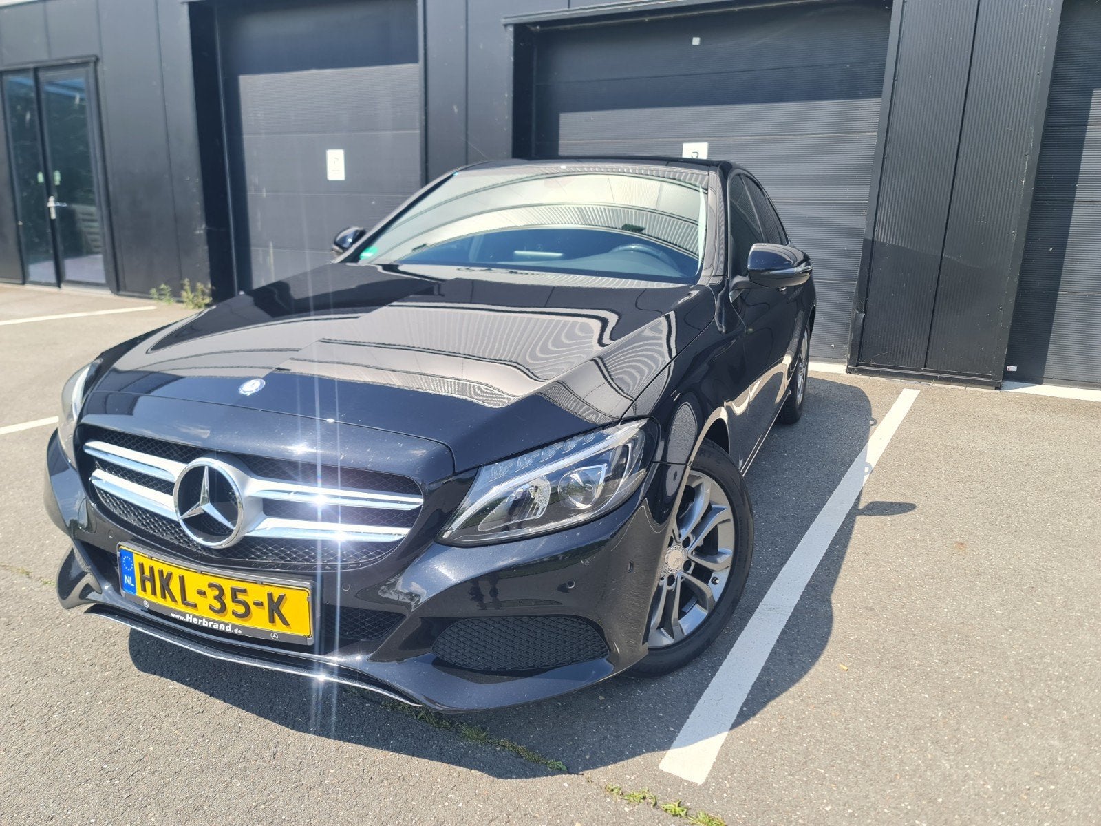 Mercedes-Benz C-Klasse C180 1.6 115KW Aut7 2016 Zwart, Auto's, Automaat, 1800 kg, Zwart, Leder en Stof