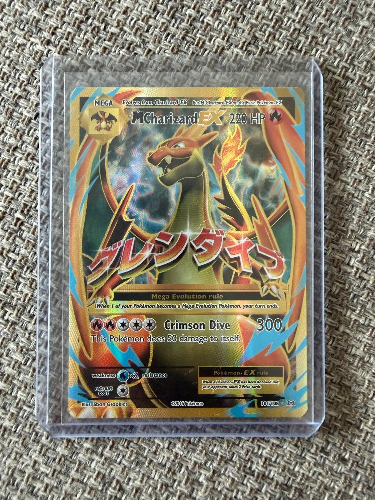 M Charizard EX 220 HP Pokémon kaart (Foil), Ophalen of Verzenden, Zo goed als nieuw, Losse kaart, Foil
