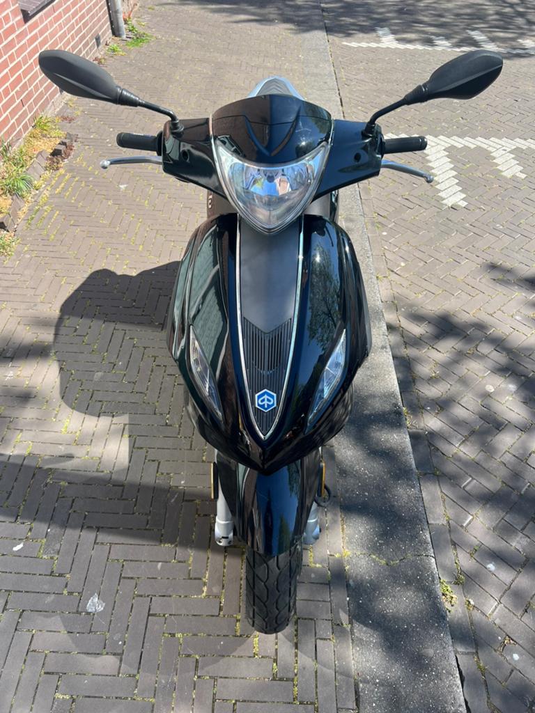 Piaggio new fly, Fietsen en Brommers, Scooters | Piaggio, Ophalen, Gebruikt, 49 cc, Fly