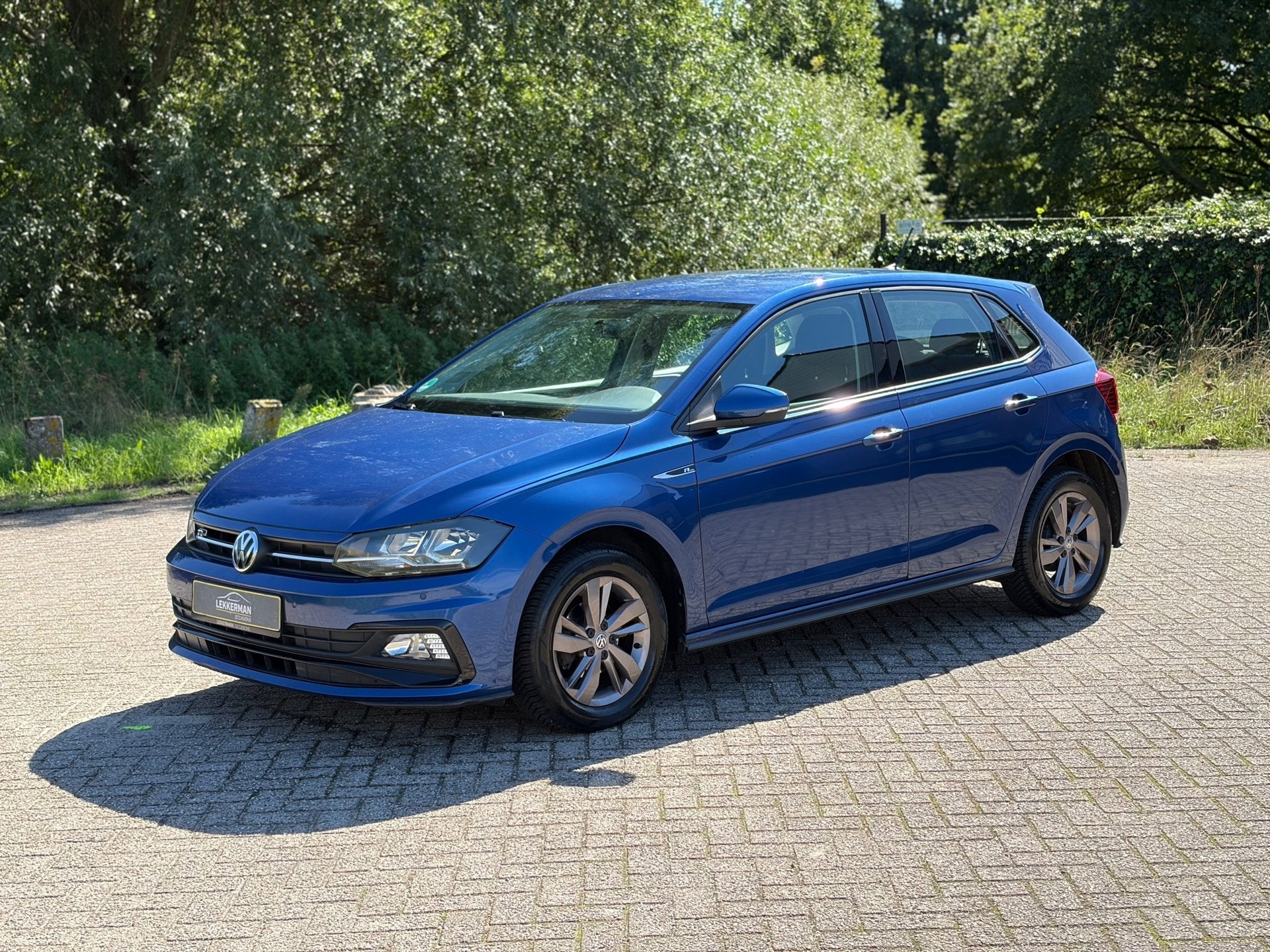 Volkswagen Polo 1.0 R-Line CARPLAY I PDC I UNIEKE KM I STOEL, Voorwielaandrijving, Dealer onderhouden, Gebruikt, Lichtsensor