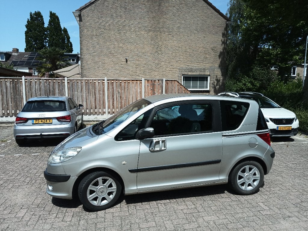 Peugeot 1007 1.4 2-TRONIC 2005 Grijs, Auto's, Stof, 1360 cc, 4 cilinders, 4 stoelen