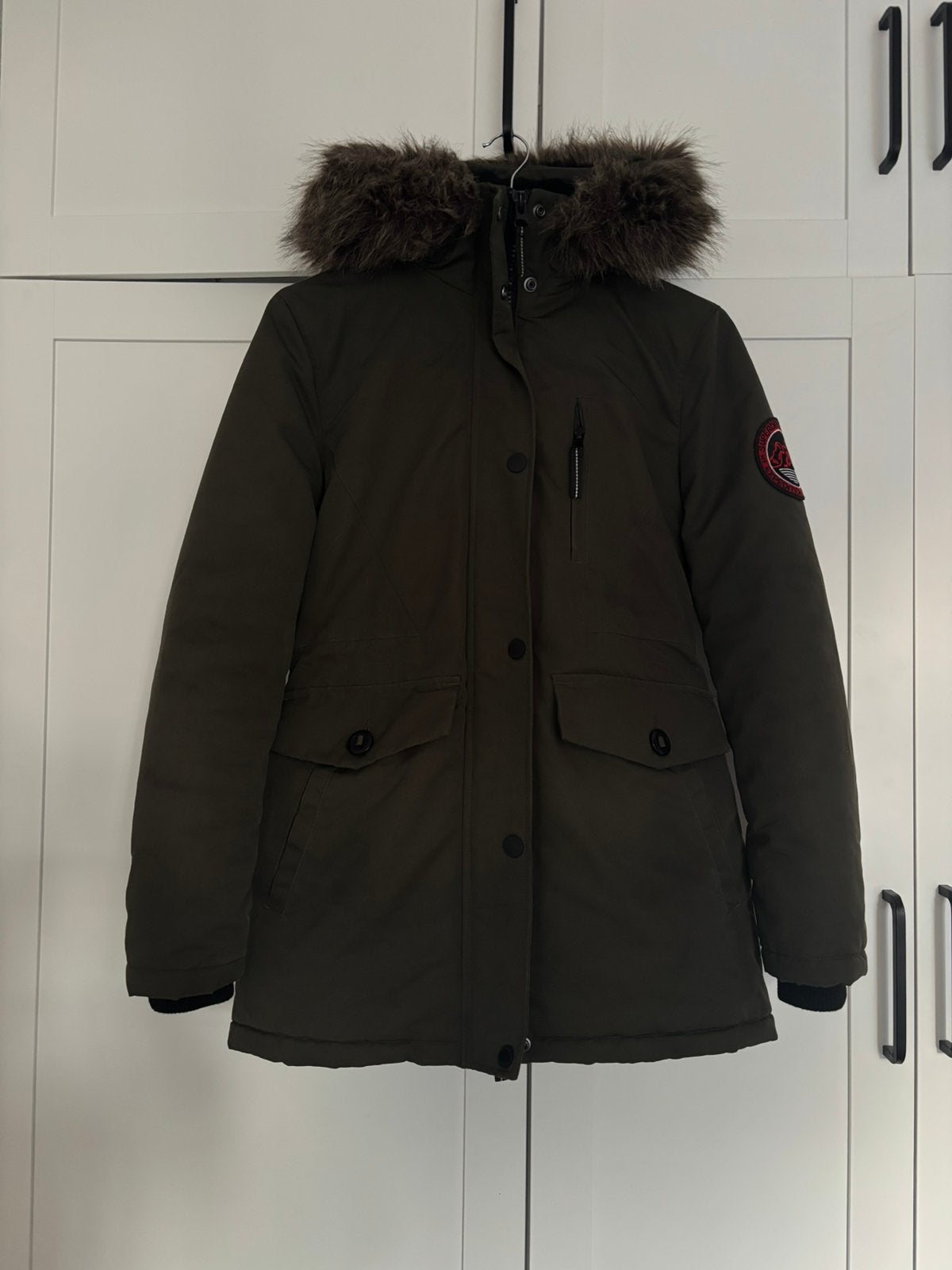 Winterjas superdry, Ophalen of Verzenden, Zo goed als nieuw, Blauw