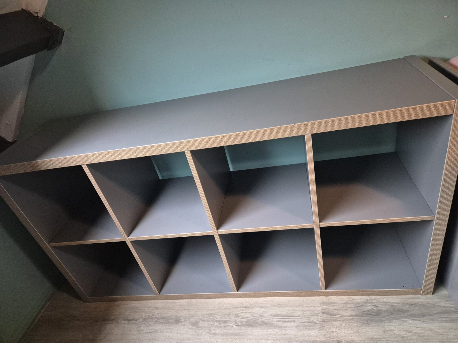Grijze kast met vakken en mandjes, Ophalen