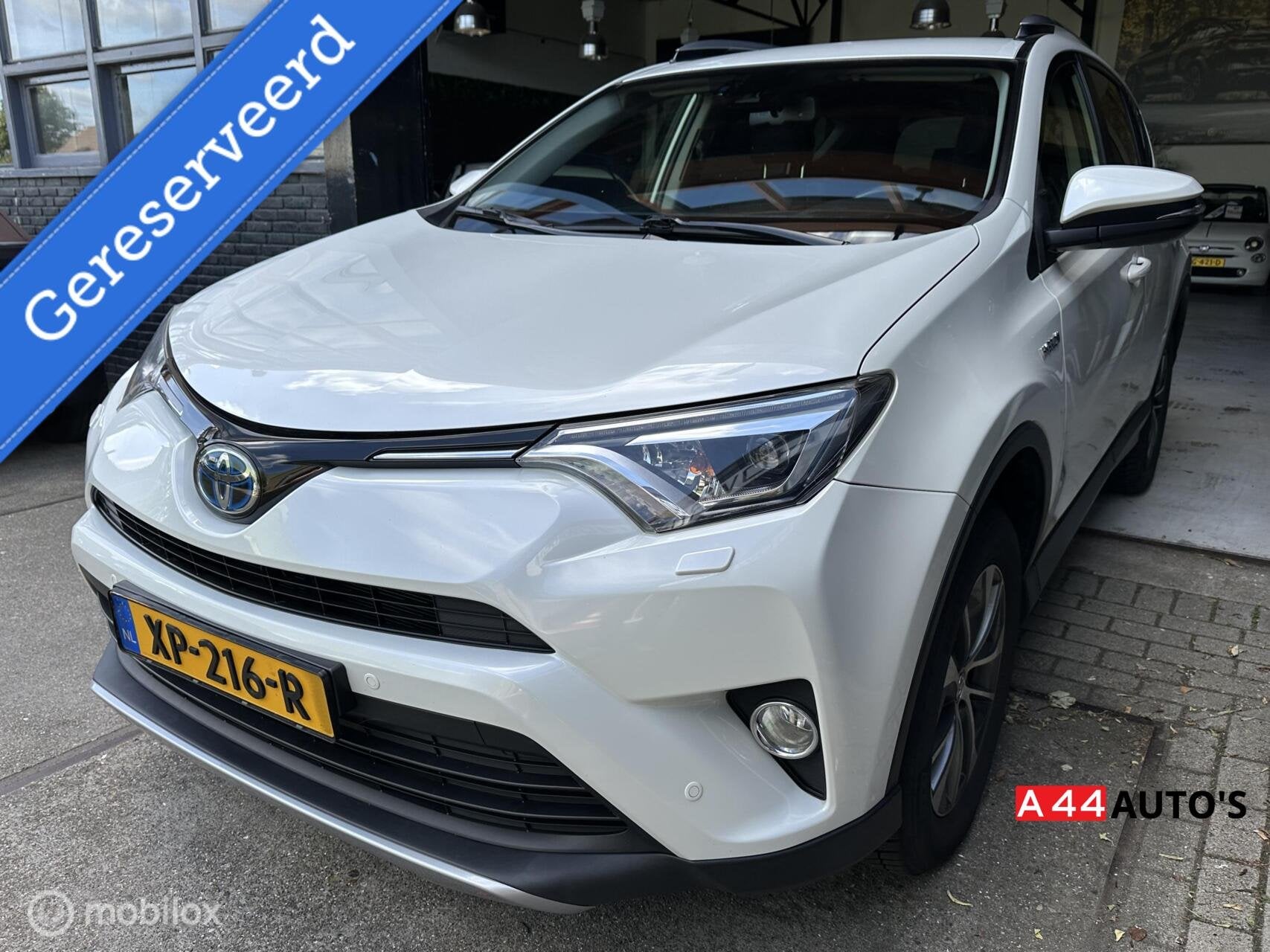 VERKOCHT!een nette Toyota RAV4 2.5 Hybrid Dynamic*, Auto's, Stof, Wit, Bedrijf, Hybride Elektrisch/Benzine