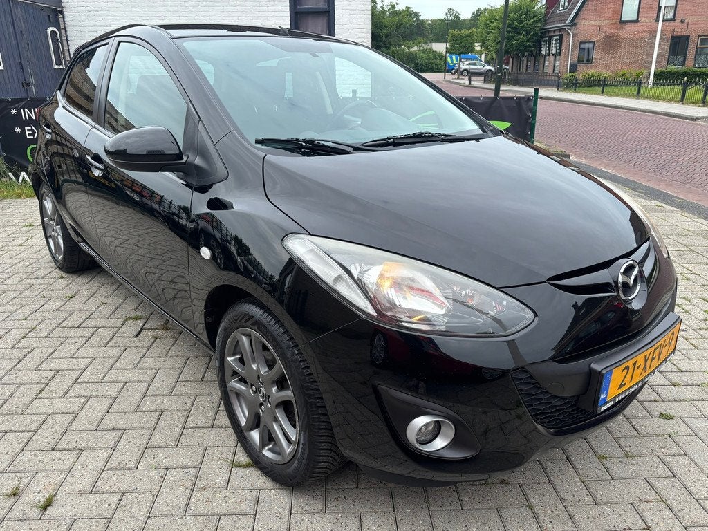 Mazda 2 1.3 BIFUEL Navigator GT | airco | cruise | trekhaak, Auto's, Mazda, Voorwielaandrijving, Euro 5, 4 cilinders, 4 stoelen