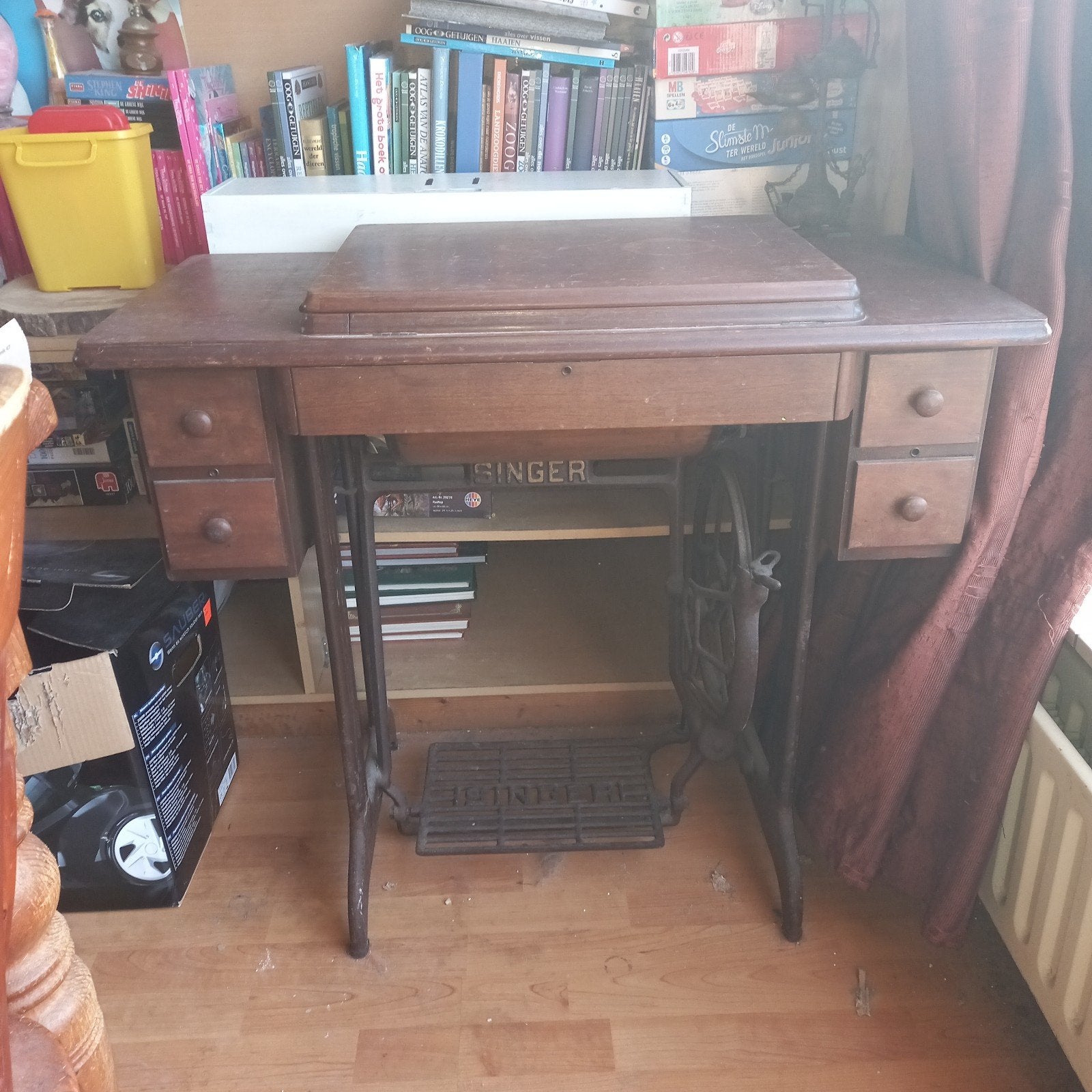 Oude singer naaimachine, Ophalen