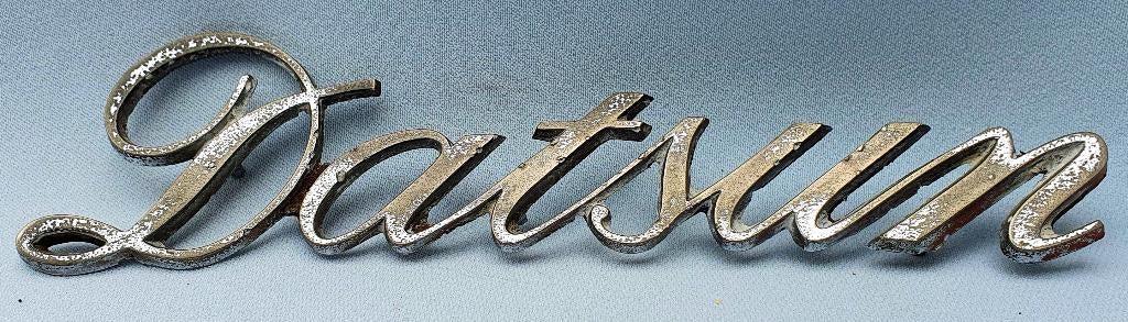 Datsun embleem 60/70er jaren, Verzenden, Gebruikt, Auto's