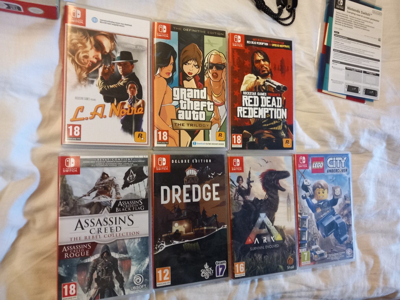 complete switch 1 oled met 11 games en 128GB SD kaart, Switch OLED, Ophalen of Verzenden, Zo goed als nieuw, Met 1 controller