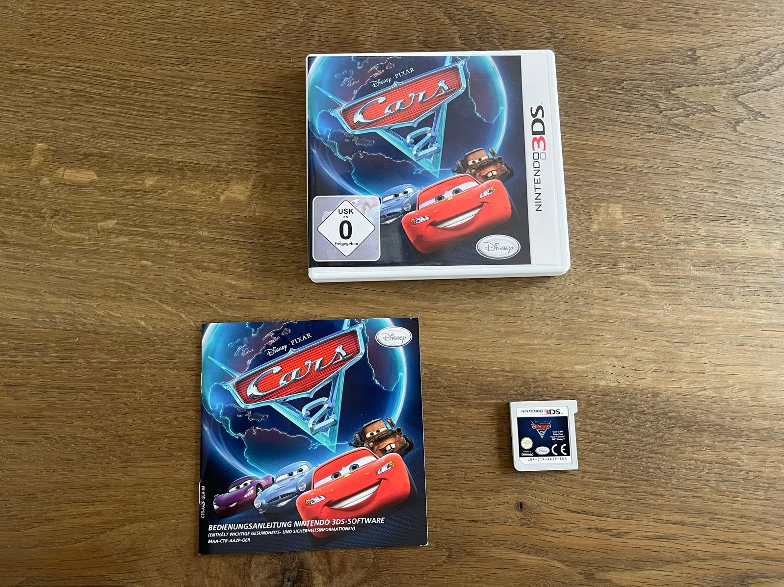 Cars 2 Nintendo 3DS - Zo goed als nieuw, Spelcomputers en Games, Games | Nintendo 2DS en 3DS, 1 speler, Racen en Vliegen, Ophalen of Verzenden