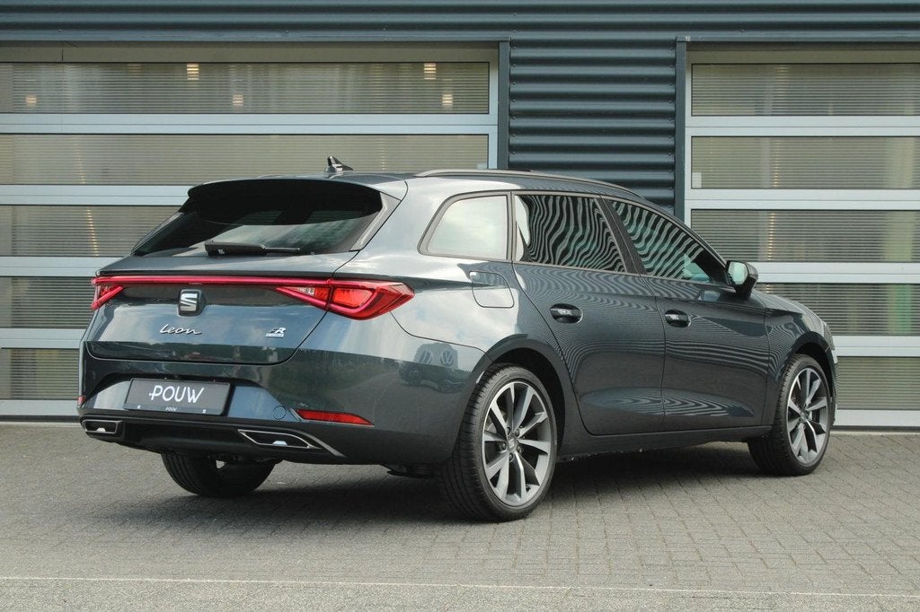 SEAT Leon Sportstourer 1.5 TSI 204pk DSG e-Hybrid FR Busines, Auto's, Seat, 12 maanden, Stof, 4 cilinders, 26 kWh
