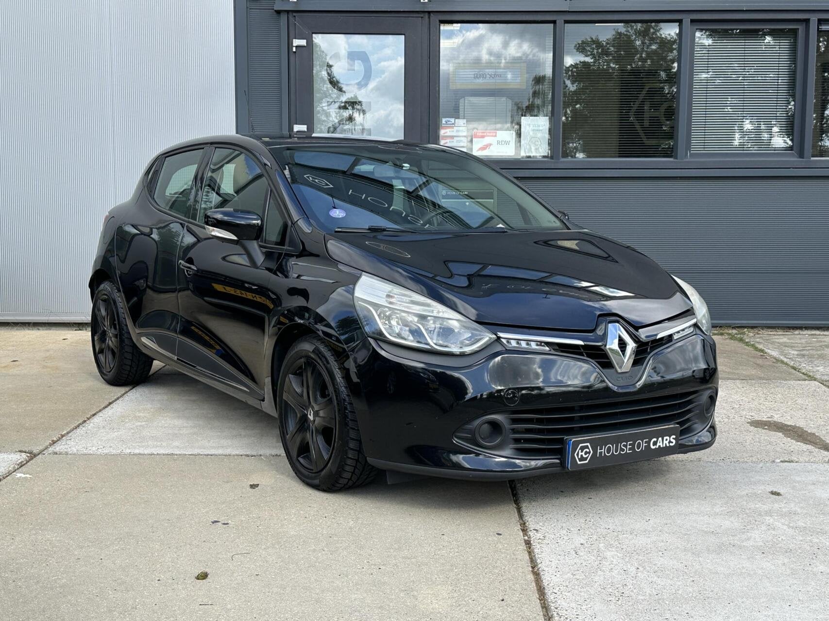 Renault Clio 1.2 16V Collection 5-Deurs Airco Cruise Navi, Auto's, Voorwielaandrijving, Euro 5, Stof, Gebruikt
