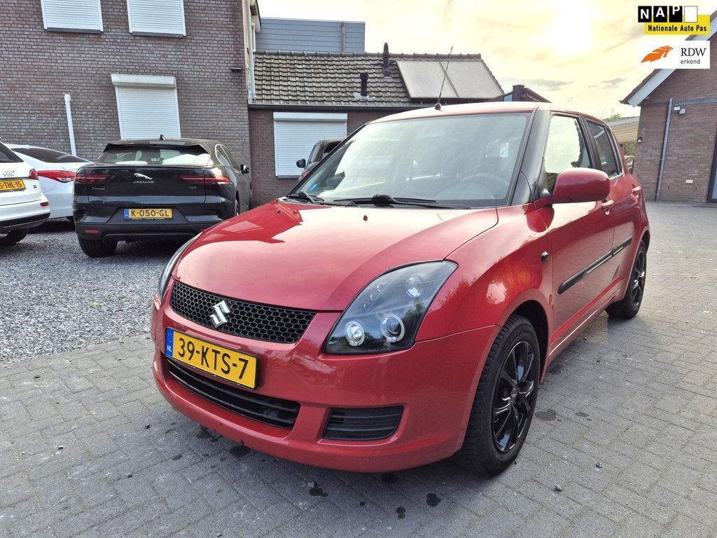Suzuki Swift 1.3 Comfort Airco 5 Deurs Trekhaak, Voorwielaandrijving, Stof, Zwart, 400 kg