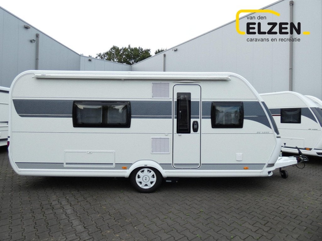 Hobby De Luxe 495 WFB Mover, luifel, badkamer, Caravans en Kamperen, Standaardzit, Schokbreker, Hobby, Bedrijf