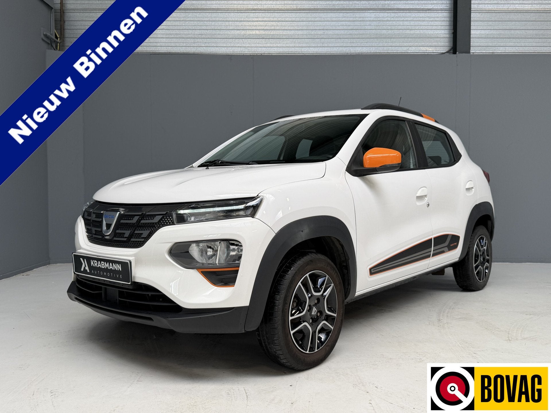 Dacia Spring Comfort Plus (Orange Pack) 27 kWh SOH 93% |GARA, Auto's, Gebruikt, Met garantie (alle), Wit, 991 kg