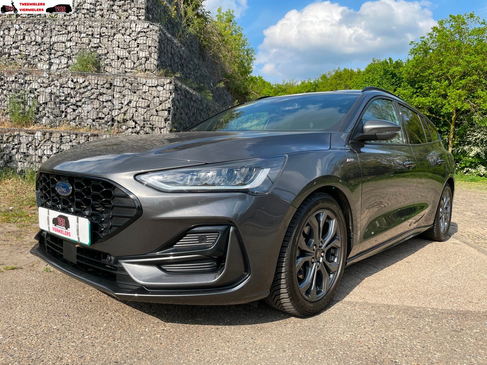 Ford Focus 1.0 EcoBoost Hybrid ST-Line CarPlay Virtual Drive, Auto's, Stof, Gebruikt, Blauw, 19 km/l