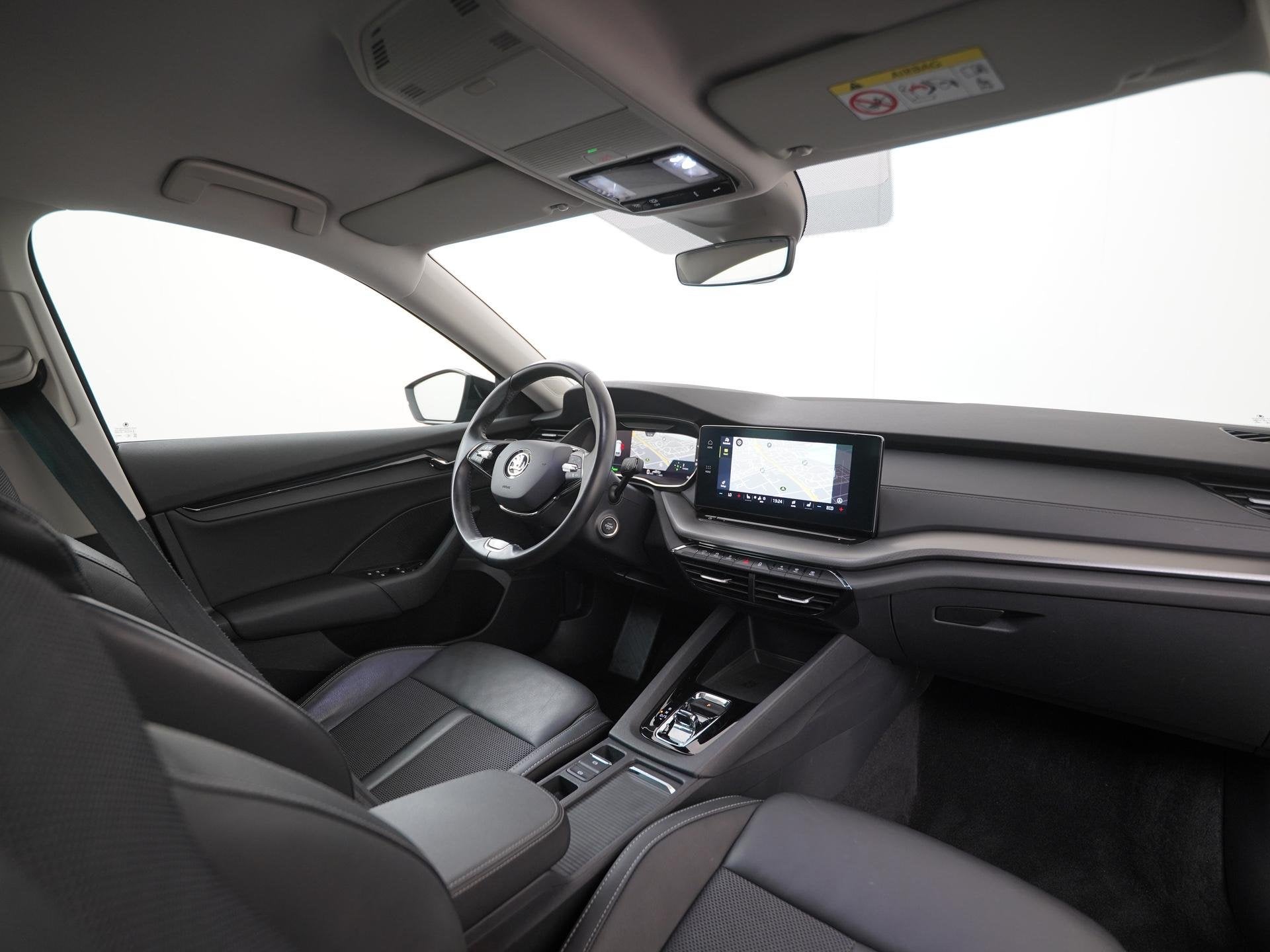 Skoda Octavia Combi 1.4 TSI iV PHEV Ambition | Stoel & Stuur, Auto's, Stof, Gebruikt, Euro 6, 4 cilinders