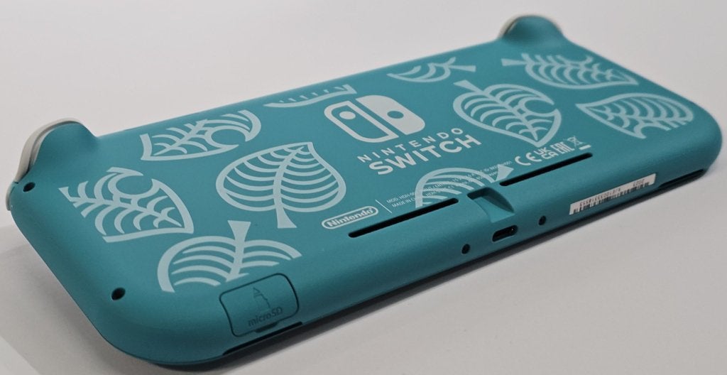 Nintendo Switch Lite - Turquoise | Retourdeal, Spelcomputers en Games, Contact@nintendo.nl, Turquoise, Ophalen of Verzenden, Zo goed als nieuw