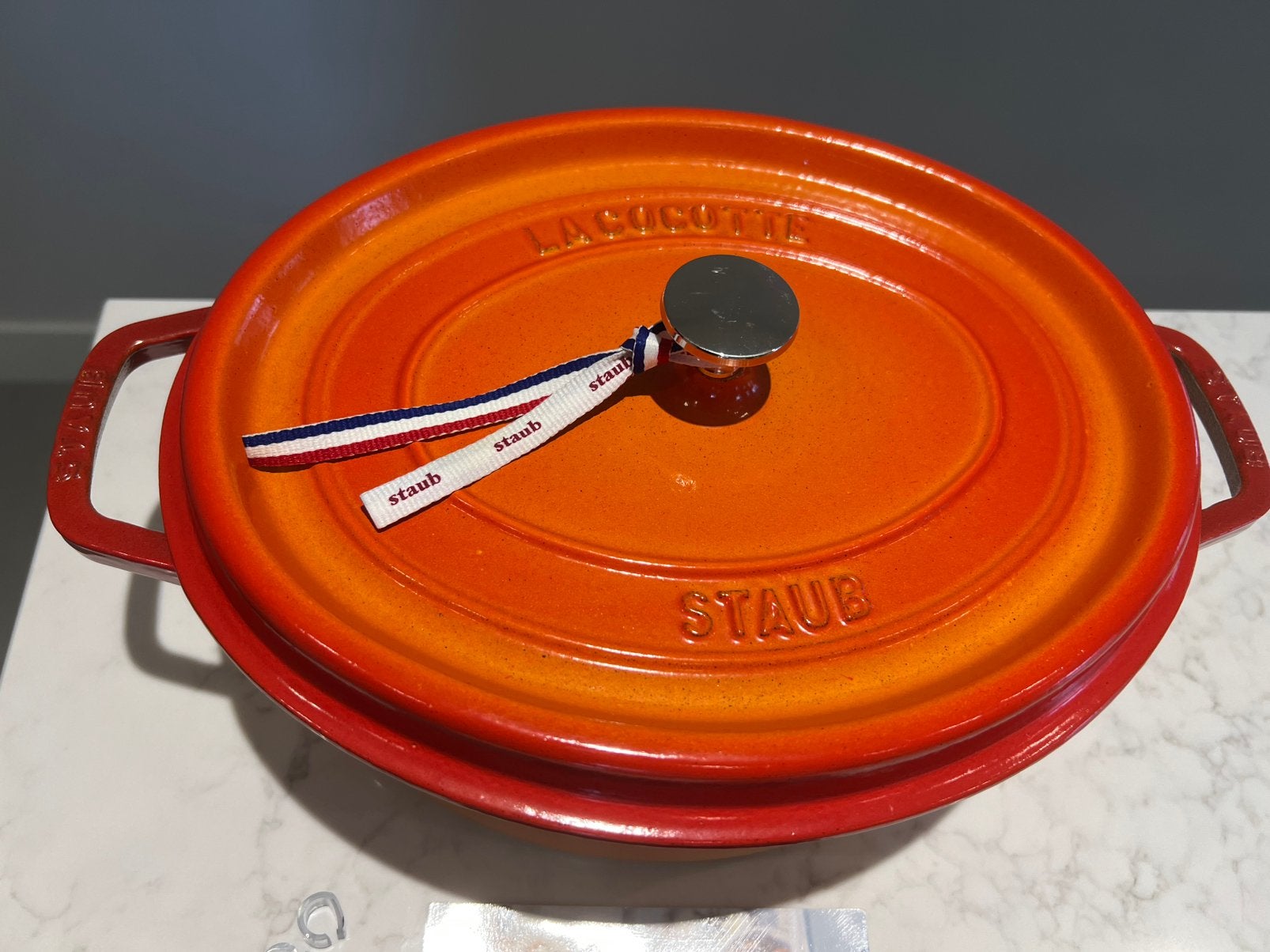 Staub La Cocotte 31 cm gevlamd Orange in heel goede staat, Met handvatten, Ophalen of Verzenden, Zo goed als nieuw, Staub