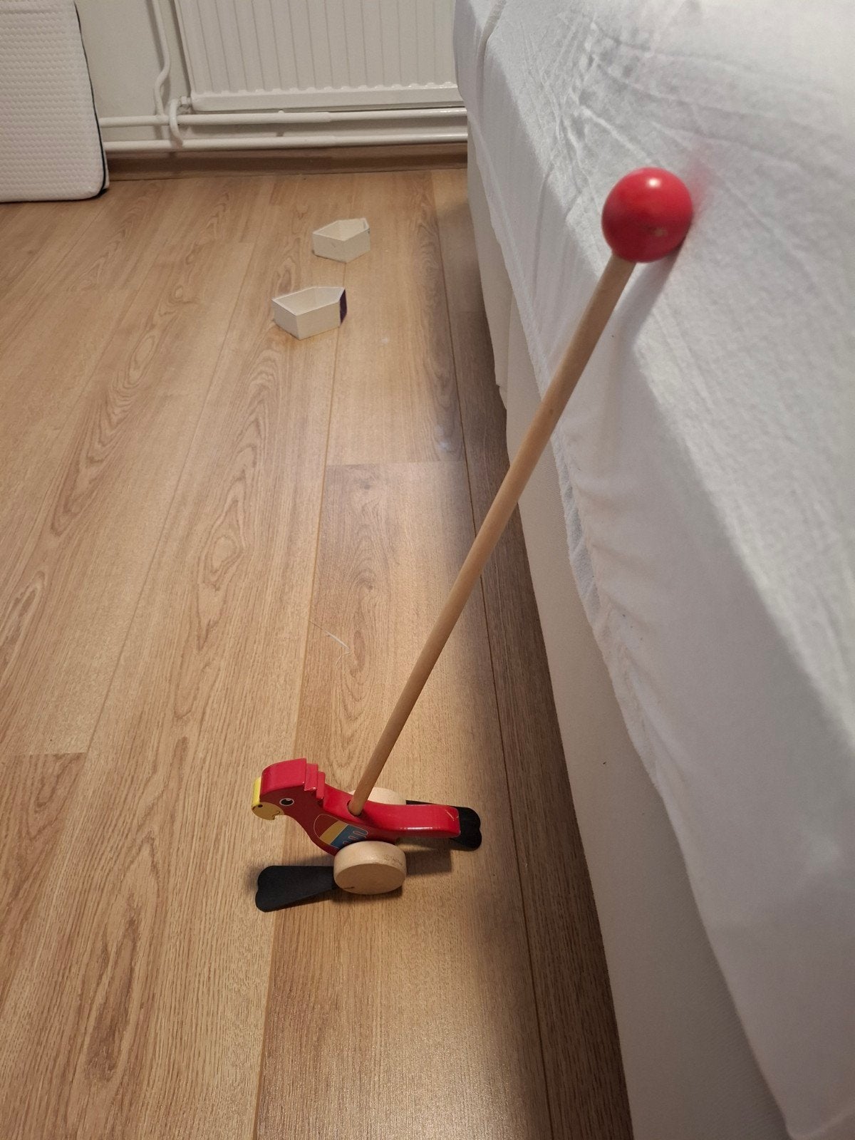 Hout speelgoed loop papagaai, Ophalen