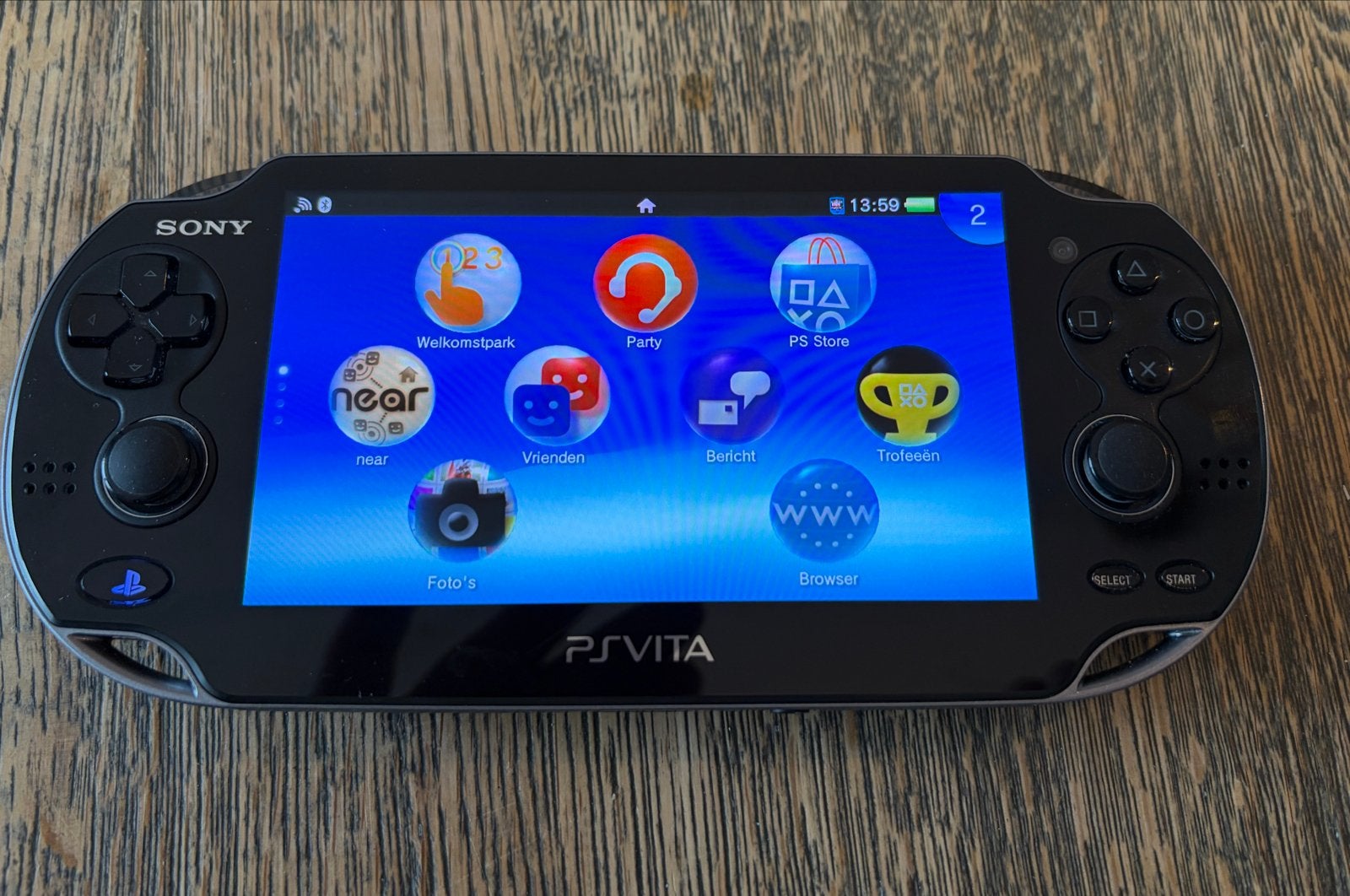 Ps Vita Playstation - in bijna nieuwstaat met game, Spelcomputers en Games, Ophalen of Verzenden, Zo goed als nieuw, Zwart, Met games