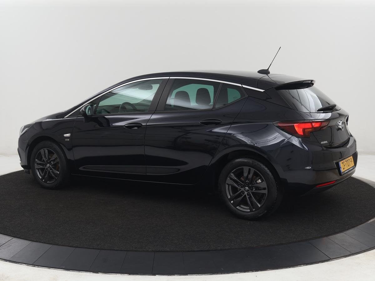 Opel Astra 1.0 Turbo 120 Jaar Edition | Carplay | DAB radio, Auto's, Stof, Gebruikt, Blauw, 610 kg