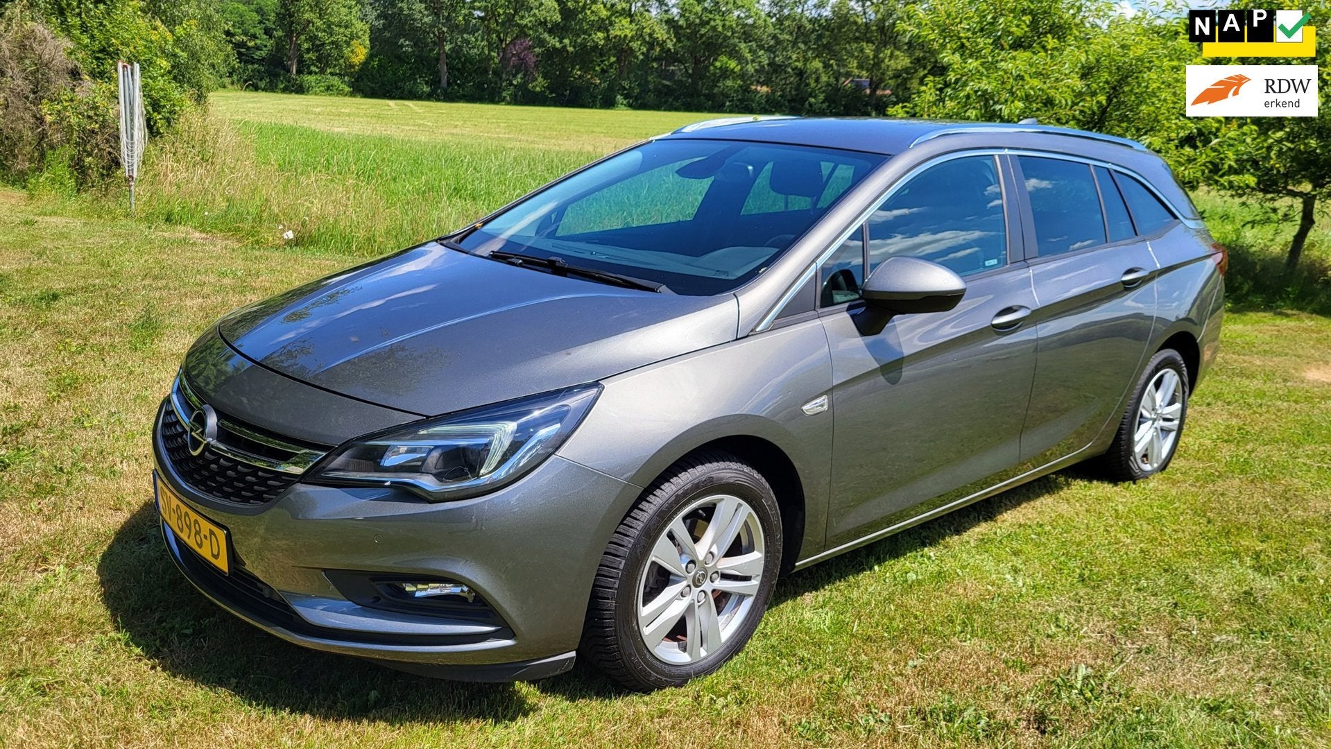 Opel Astra Sports Tourer 1.4 Online Edition (rijklaar) Grijs, Stof, Gebruikt, Euro 6, 4 cilinders