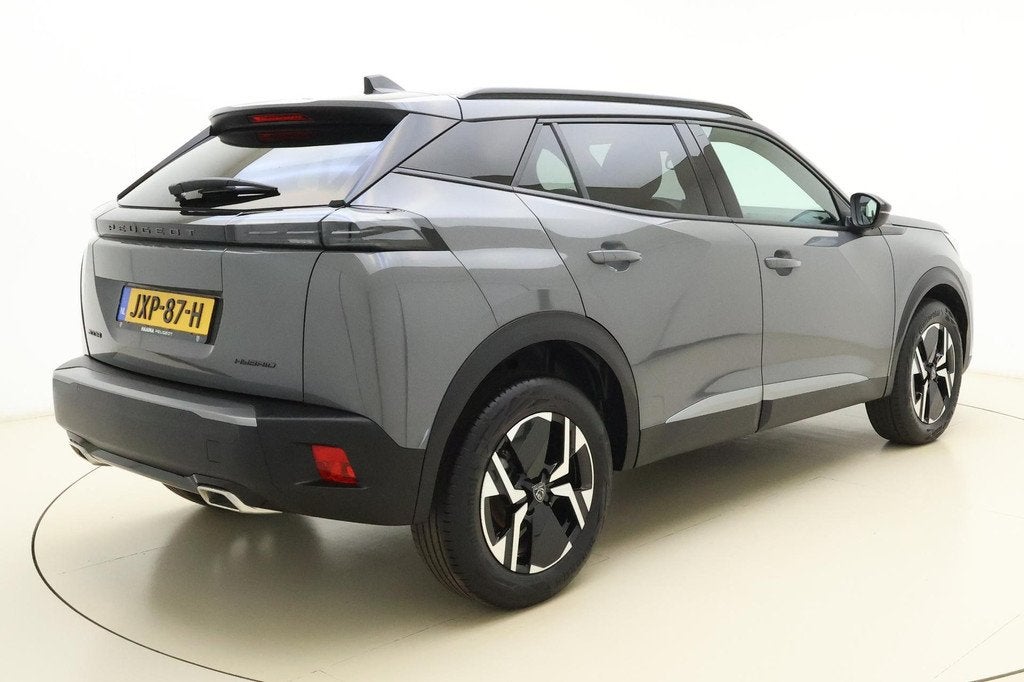 Peugeot 2008 1.2 Hybrid 145 Allure | Climate & Cruise Contro, Auto's, Peugeot, 1272 kg, Euro 6, 1199 cc, Leder en Stof