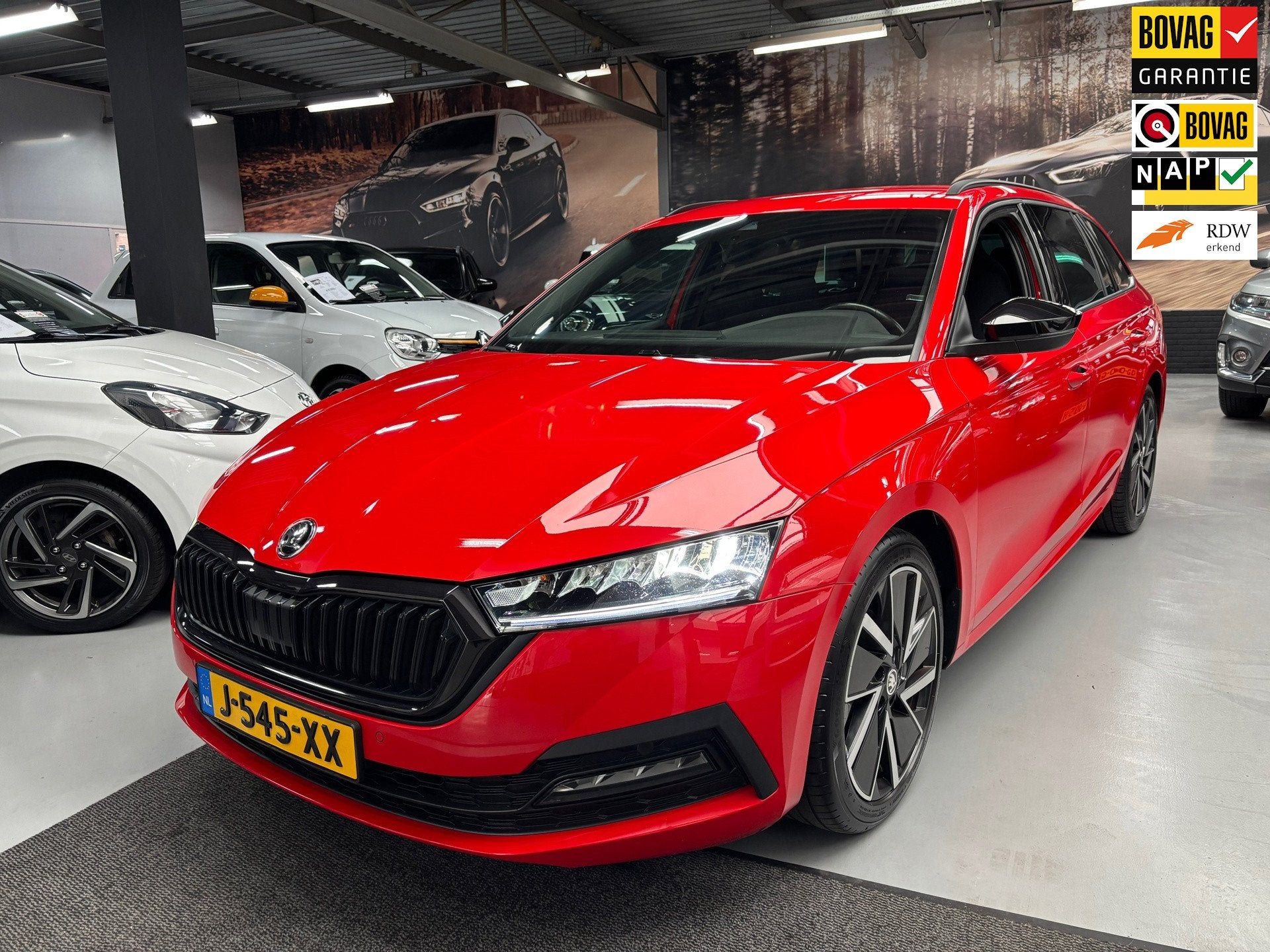 Skoda Octavia Combi 1.0 TSI Sport Business / Navigatie, Dealer onderhouden, Stof, Gebruikt, Met garantie (alle)