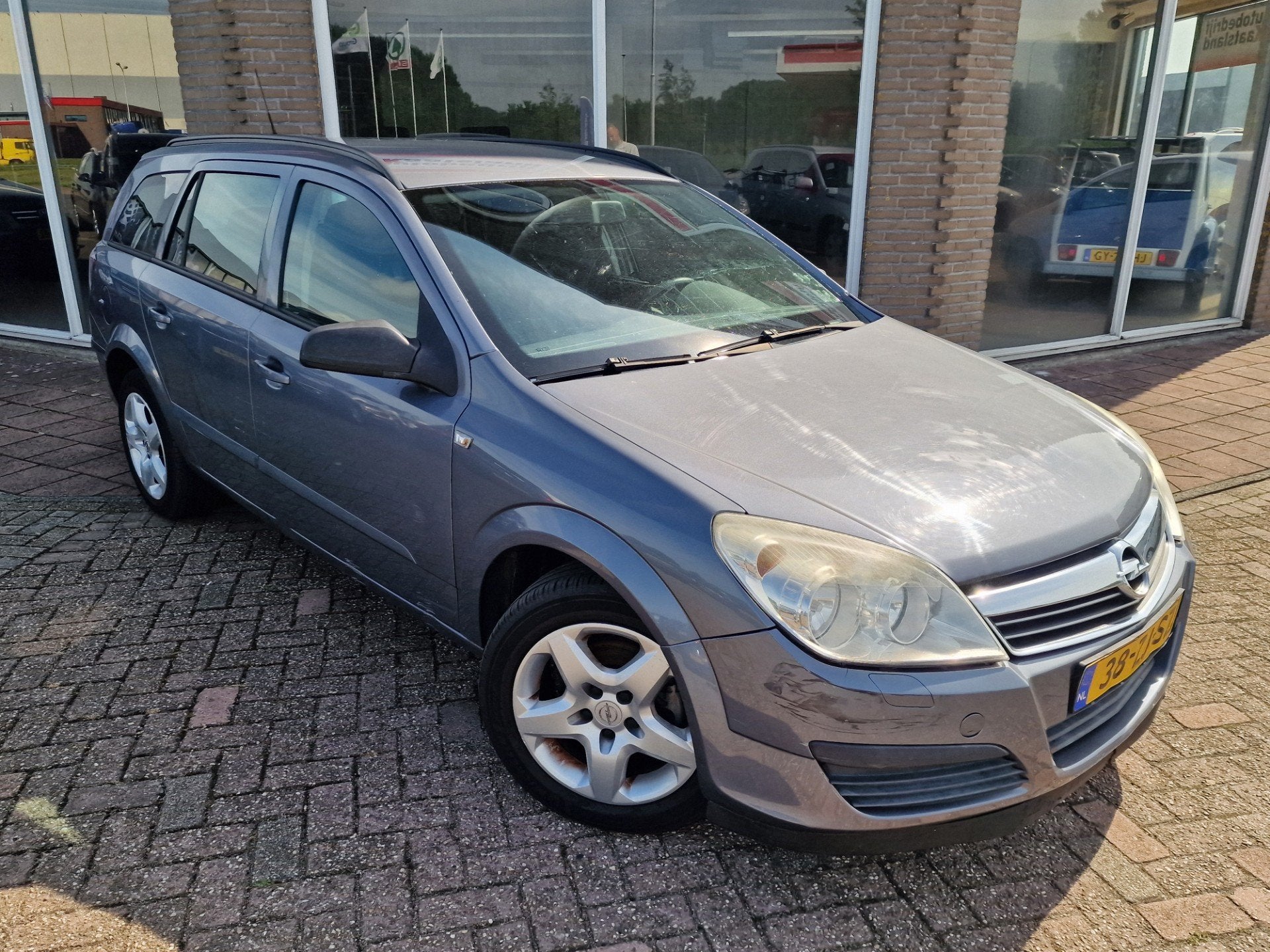 Opel Astra Wagon 1.6 Business - KOPPELING SLECHT -, Auto's, Voorwielaandrijving, Gebruikt, Zwart, 4 cilinders