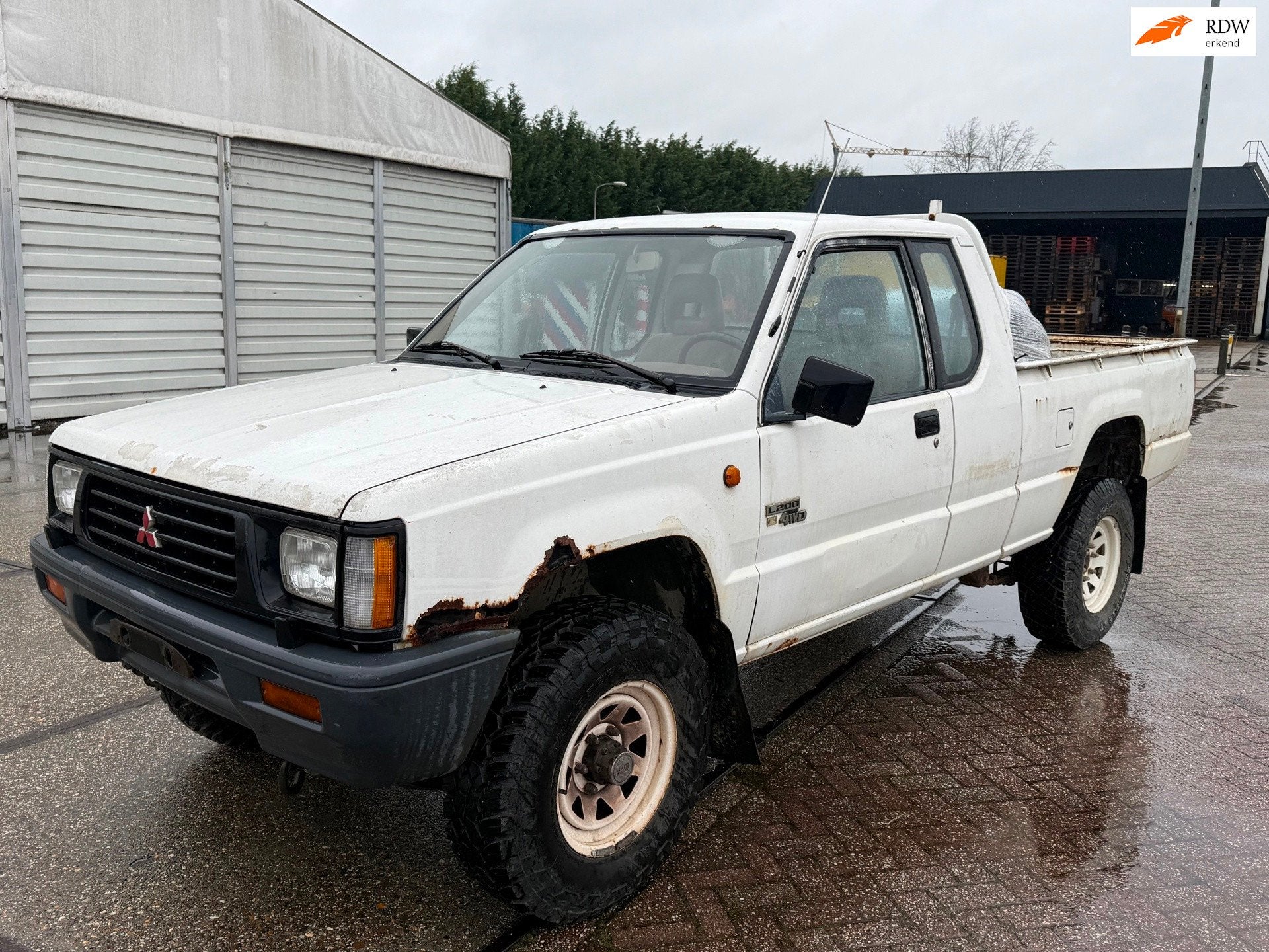 Mitsubishi L 200 2.5 Club Cab 4x4 Schuurvondst ! origineel N, Auto's, Stof, Gebruikt, Zwart, 4 cilinders