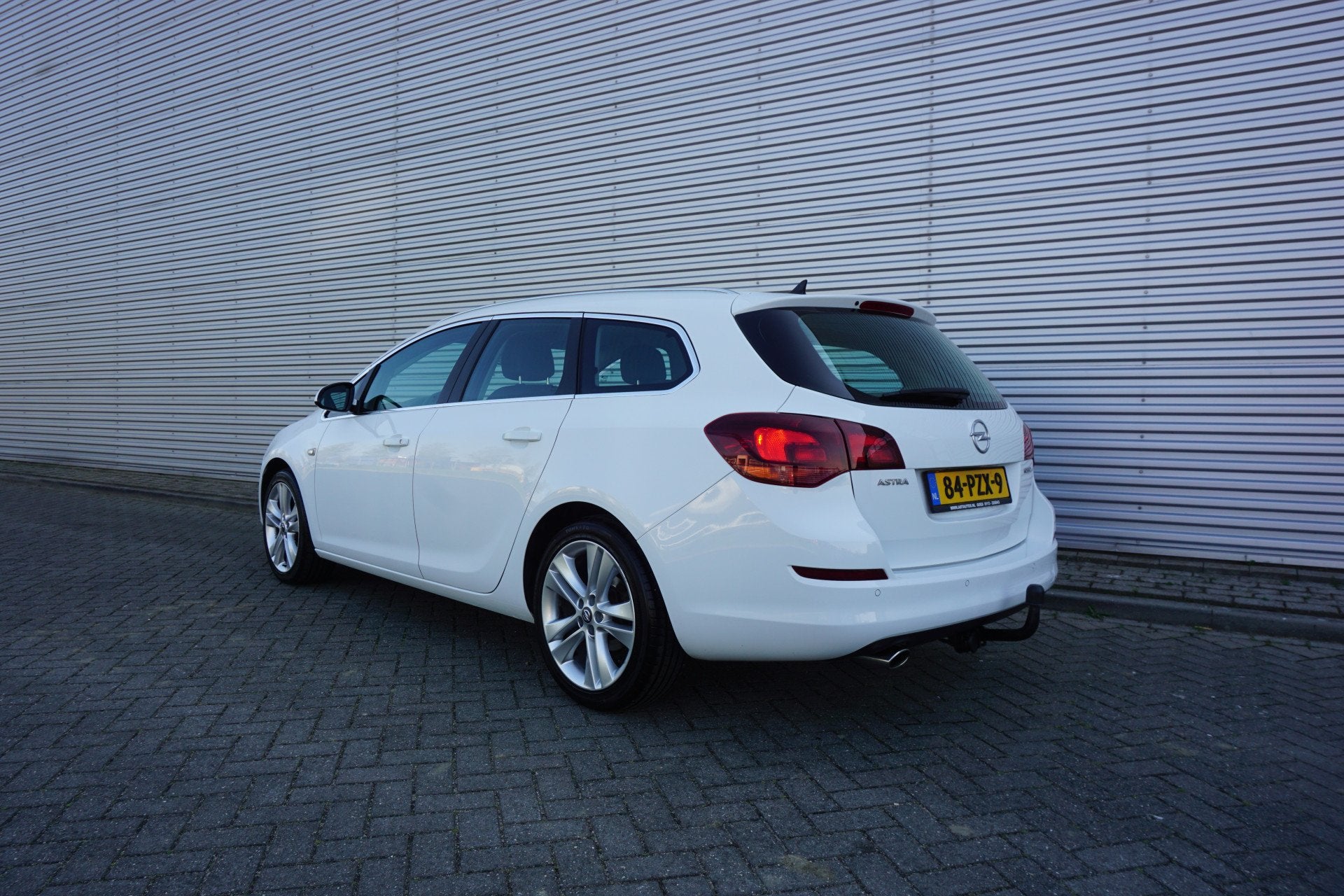 Opel Astra Sports Tourer 1.4 Turbo Sport Airco / Cruise / Na, Voorwielaandrijving, Euro 5, Gebruikt, 4 cilinders