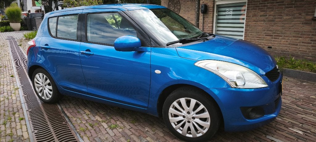Suzuki Swift 1.2 5-D 2012 Blauw, Auto's, Voorwielaandrijving, Stoelverwarming, Stof, 4 cilinders