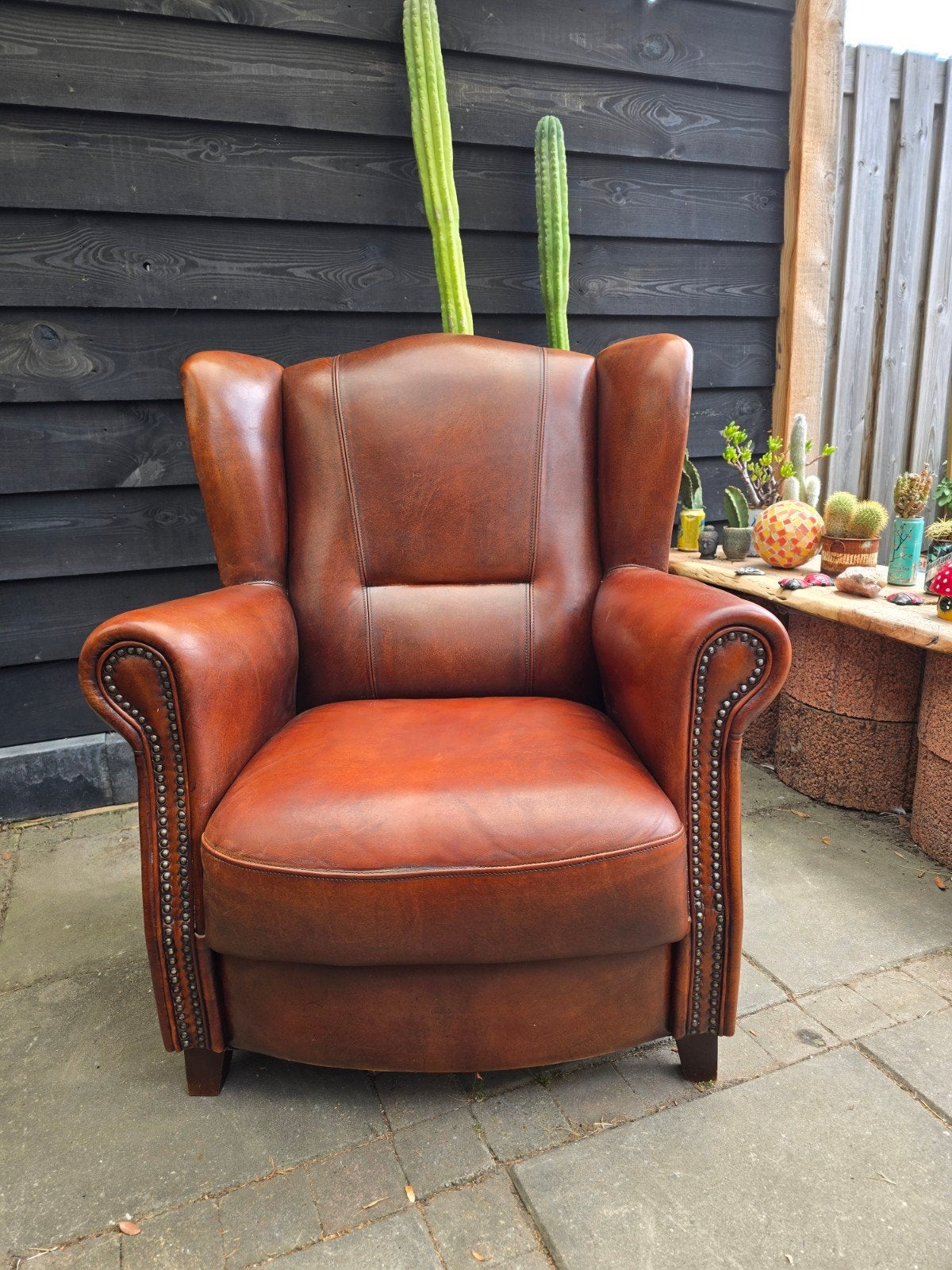 schapenleren herenstoel,Joris design, Huis en Inrichting, Fauteuils, Ophalen, Zo goed als nieuw, Klassiek ,industrieel, Leer