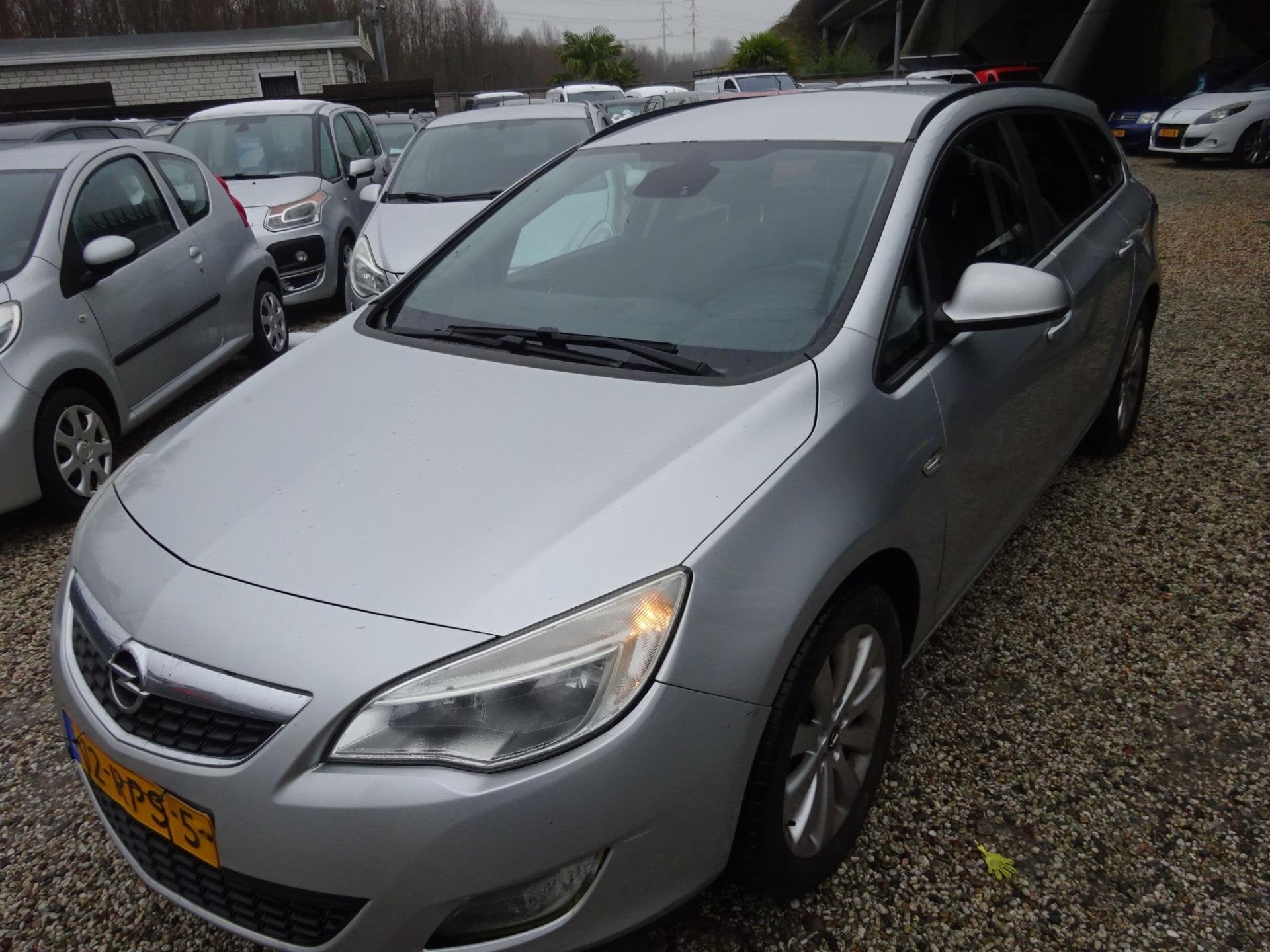 Opel Astra Sports Tourer 1.4 Turbo Cosmo, Navigatie, Cruise, Auto's, Opel, Voorwielaandrijving, Euro 5, Gebruikt, 4 cilinders