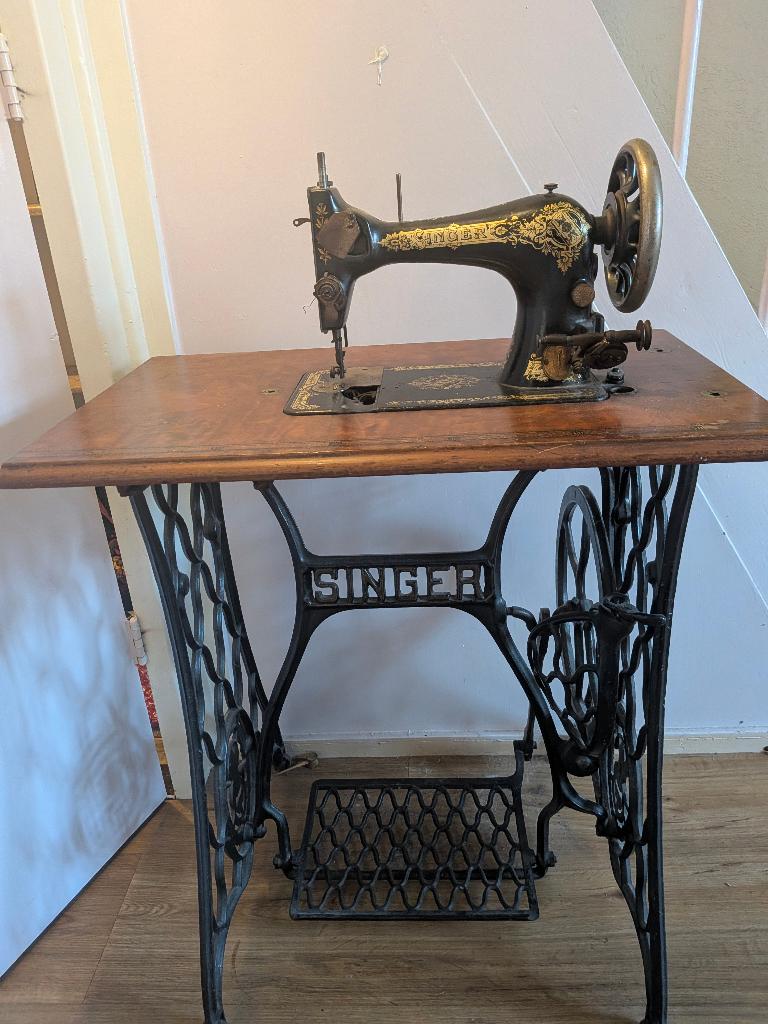 antieke singer naaimachine, Ophalen