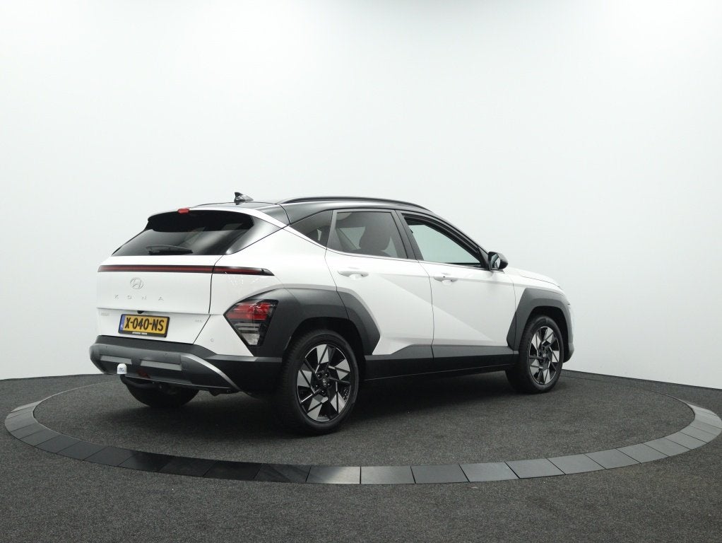 Hyundai KONA 1.6 GDI HEV Comfort Smart | Trekhaak | All seas, Auto's, 12 maanden, Stof, Gebruikt, Wit